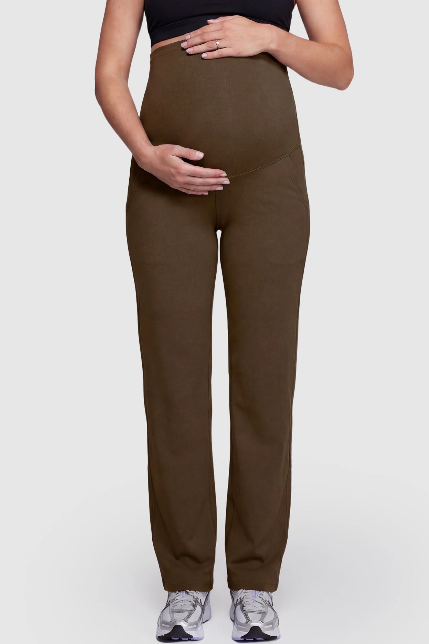 Suede-Finish High-Waisted Straight Leg Yoga Maternity Pants Suede-finish high-waisted straight leg yoga maternity pants in coffee with belly support band, front view on pregnant model