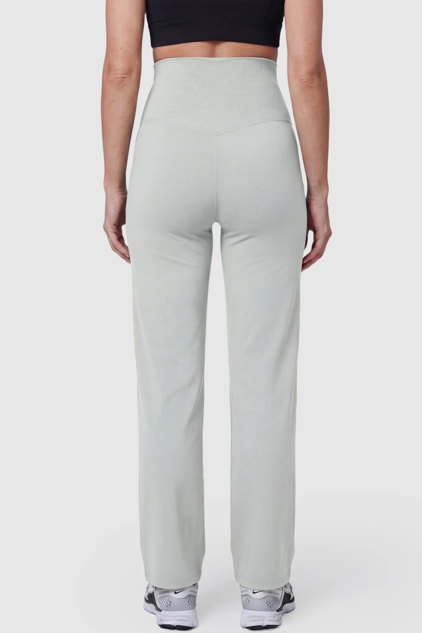 Suede-Finish High-Waisted Straight Leg Yoga Maternity Pants Suede-finish high-waisted straight leg yoga maternity pants in granny-gray with straight-leg cut, back view on pregnant model