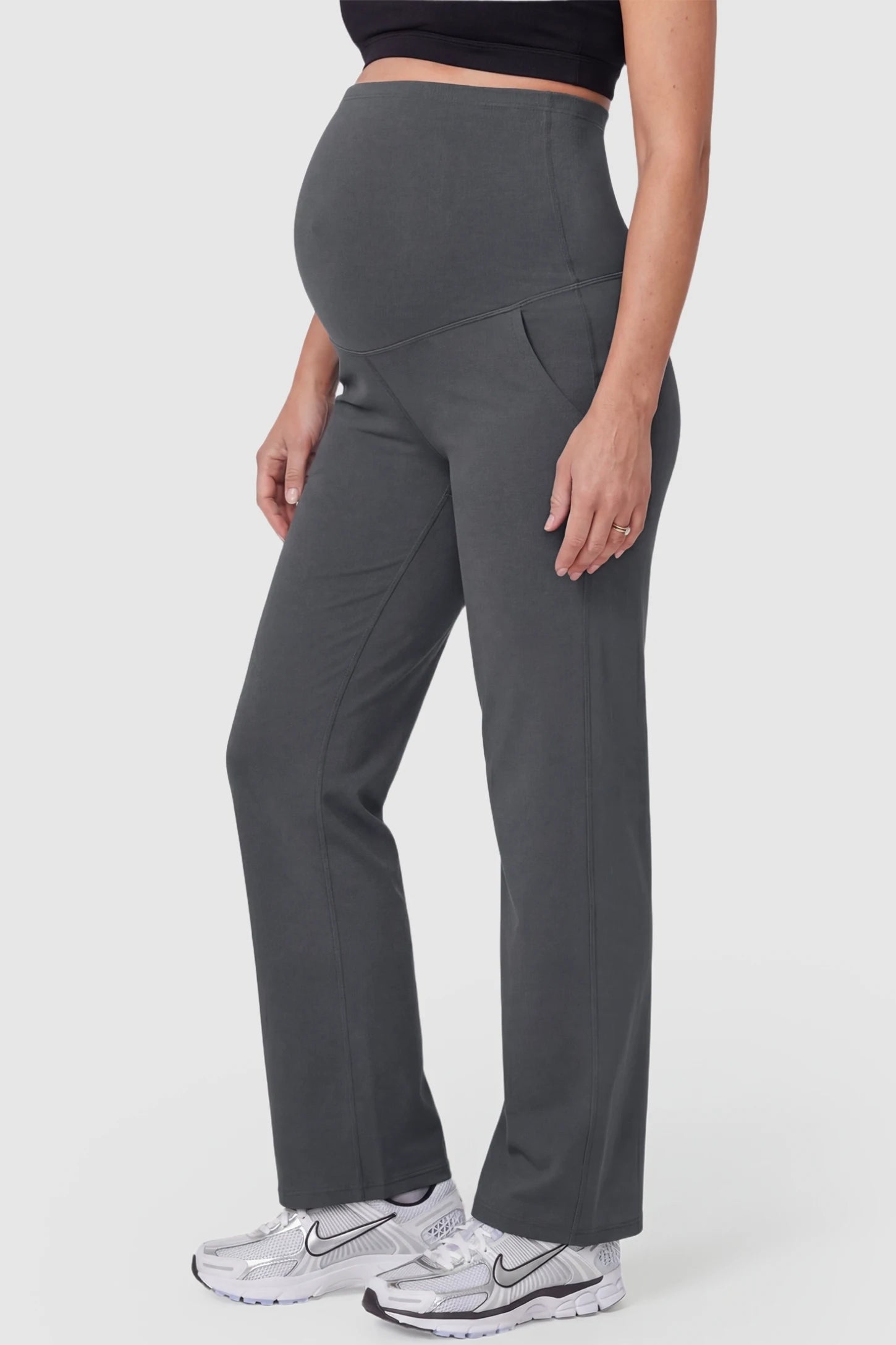 Suede-Finish High-Waisted Straight Leg Yoga Maternity Pants Suede-finish high-waisted straight leg yoga maternity pants in gray with zippered pockets, side view on pregnant model