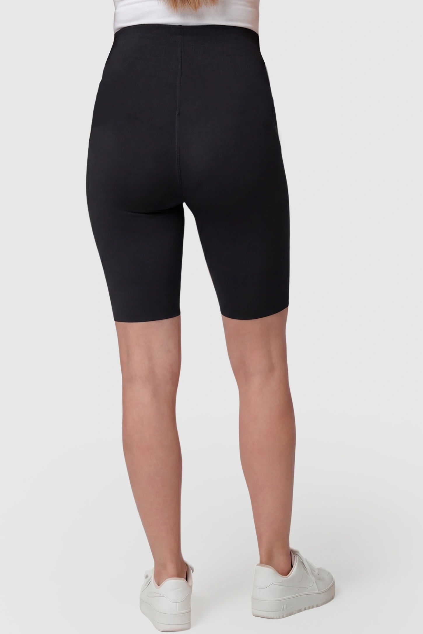 High-Waist Belly Support Slim Fit Shark Maternity Shorts High-waist belly support slim fit shark maternity shorts in black with flexible fit, back view on pregnant model