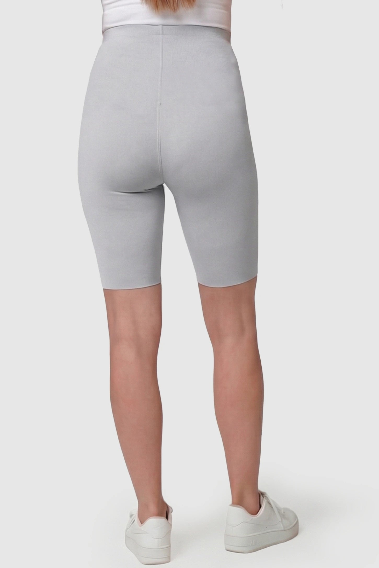 High-Waist Belly Support Slim Fit Shark Maternity Shorts High-waist belly support slim fit shark maternity shorts in light gray with flexible fit, back view on pregnant model