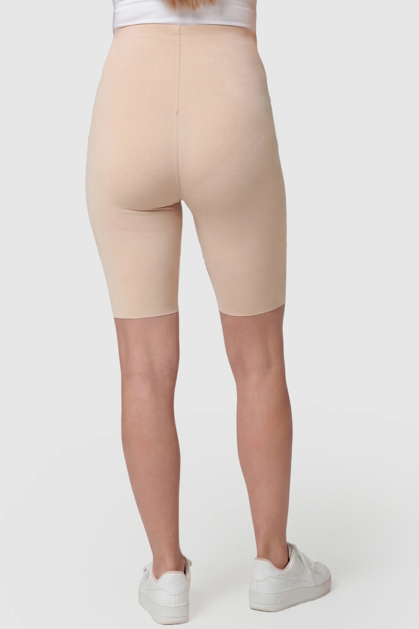 High-Waist Belly Support Slim Fit Shark Maternity Shorts High-waist belly support slim fit shark maternity shorts in skin tone with flexible fit, back view on pregnant model