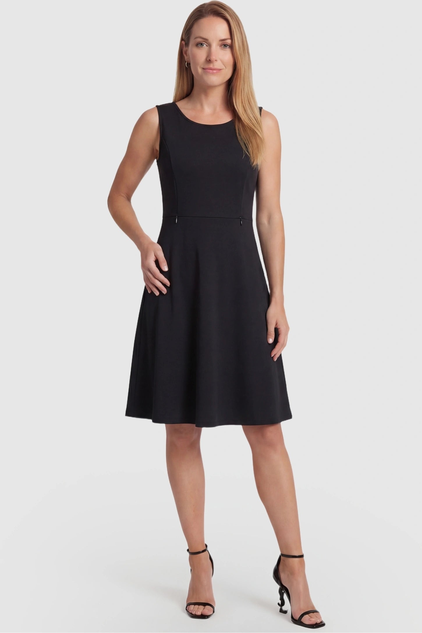 Zip-Up Nursing Access A-Line Maternity Tank Dress Zip-Up Nursing Access A-Line Maternity Tank Dress in Black featuring a flattering flared skirt on a non-pregnant model, front view.