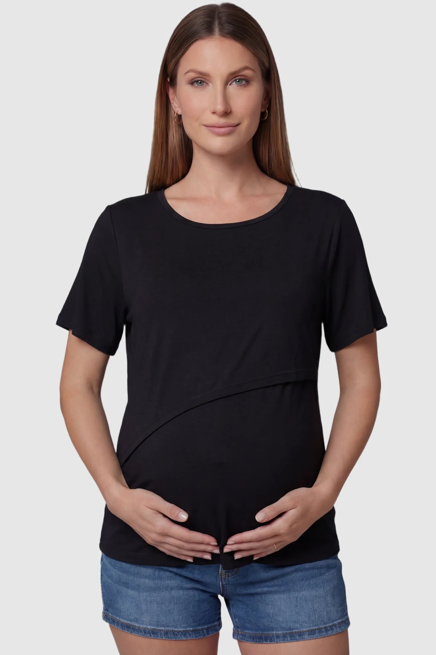 Double Layer Short Sleeve Maternity Nursing Top Double Layer Short Sleeve Maternity Nursing Top in Black featuring a discreet lift-up layer on a pregnant model front view.