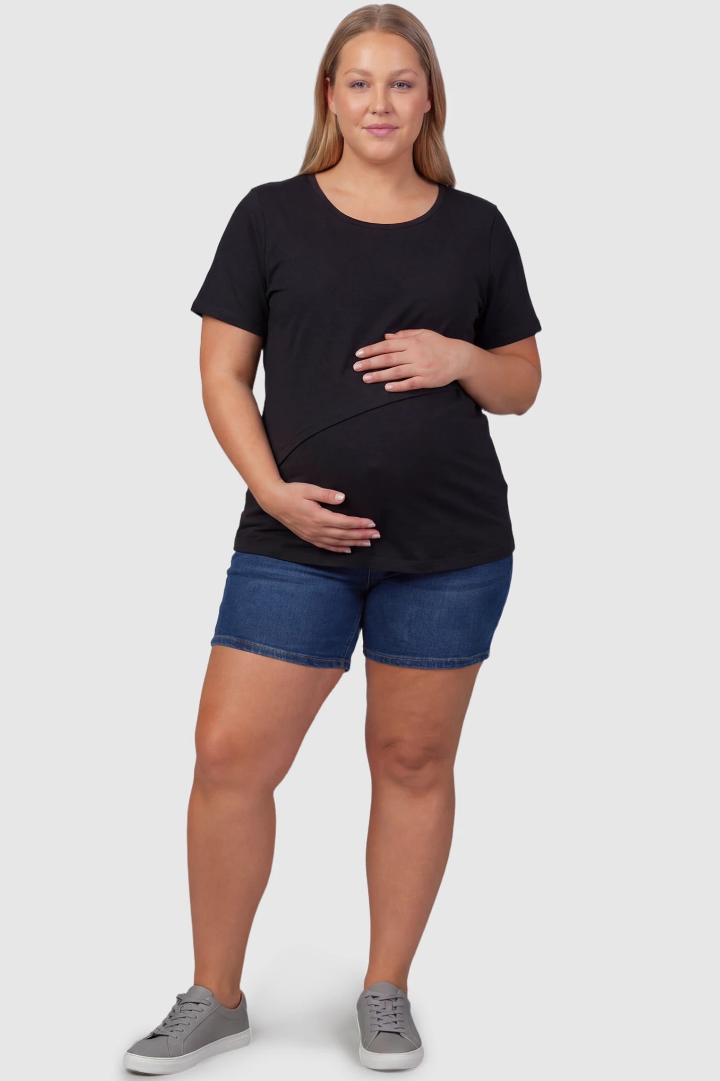 Double Layer Short Sleeve Maternity Nursing Top Double Layer Short Sleeve Maternity Nursing Top in Black featuring a discreet lift-up layer on a plus size pregnant model front view.