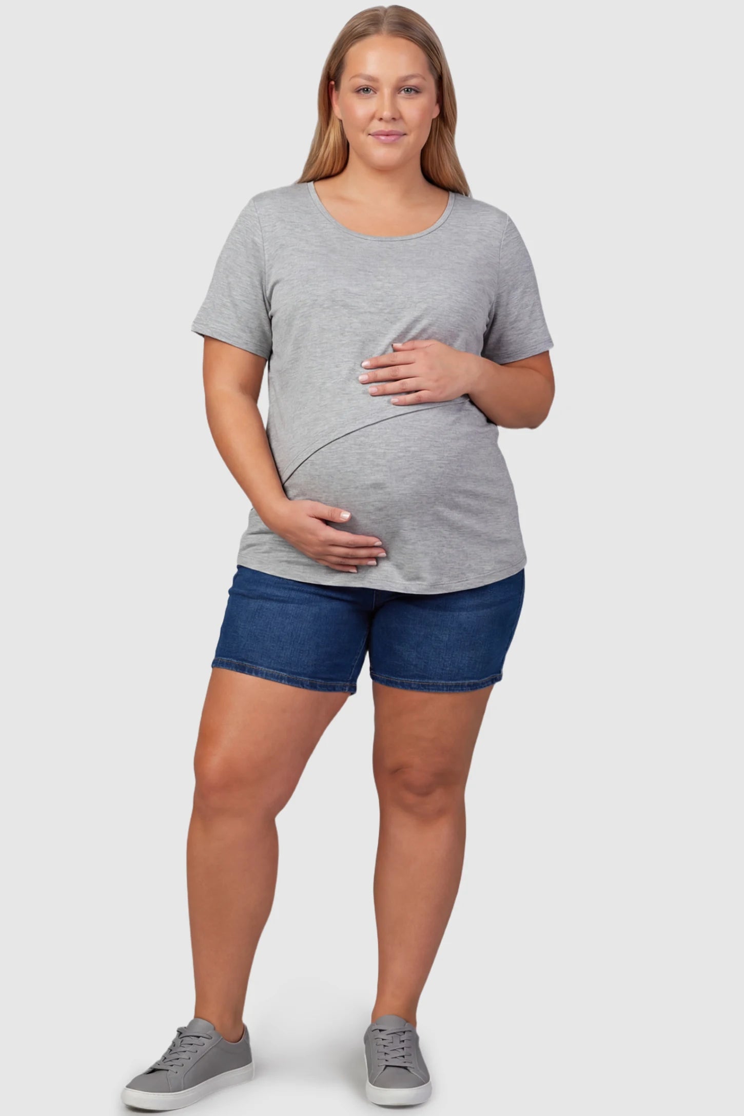 Double Layer Short Sleeve Maternity Nursing Top Double Layer Short Sleeve Maternity Nursing Top in Light Gray featuring a discreet lift-up layer on a plus size pregnant model front view.
