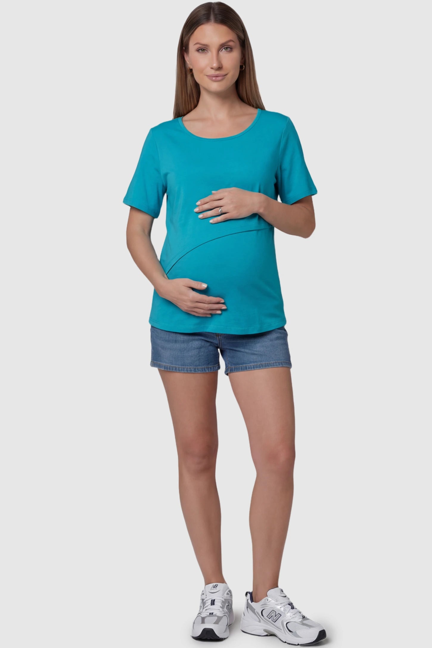 Double Layer Short Sleeve Maternity Nursing Top Double Layer Short Sleeve Maternity Nursing Top in Navy Blue featuring a discreet lift-up layer on a pregnant model full body view.