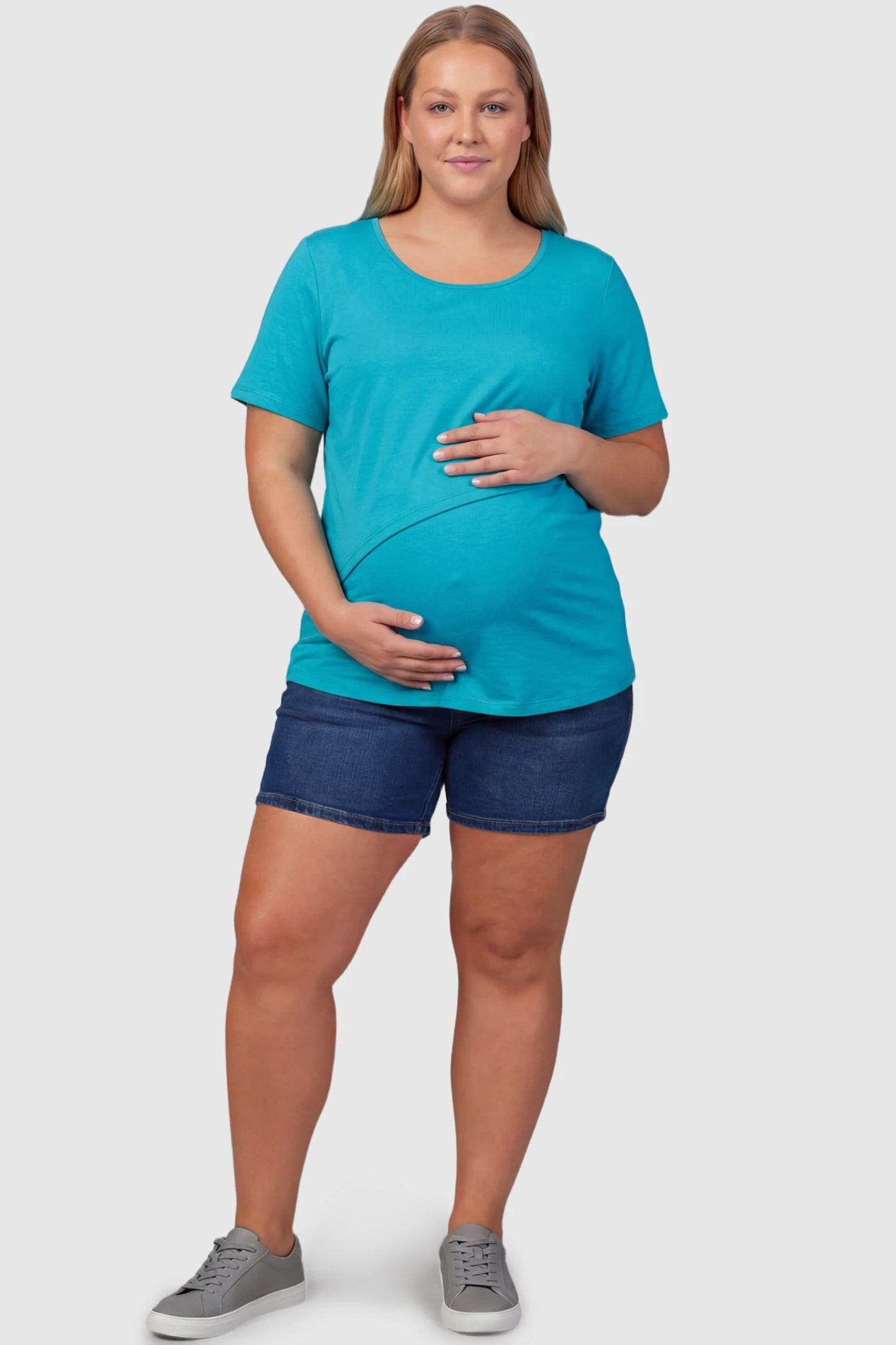 Double Layer Short Sleeve Maternity Nursing Top Double Layer Short Sleeve Maternity Nursing Top in Navy Blue featuring a discreet lift-up layer on a plus size pregnant model front view.