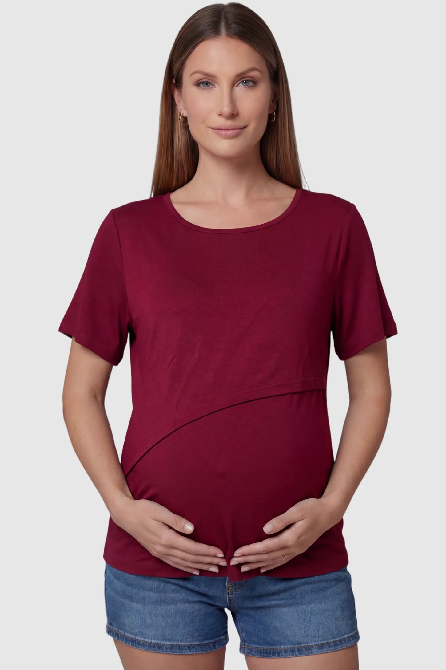 Double Layer Short Sleeve Maternity Nursing Top Double Layer Short Sleeve Maternity Nursing Top in Wine Red featuring a discreet lift-up layer on a pregnant model front view.