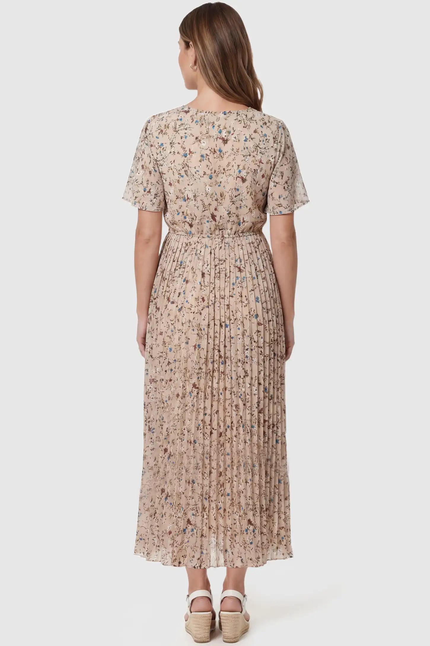 Floral Print Round Neck Pleated Maternity Midi Dress Floral Print Round Neck Pleated Maternity Midi Dress in Beige Floral Print featuring a pleated A-line skirt on a pregnant model, back view.