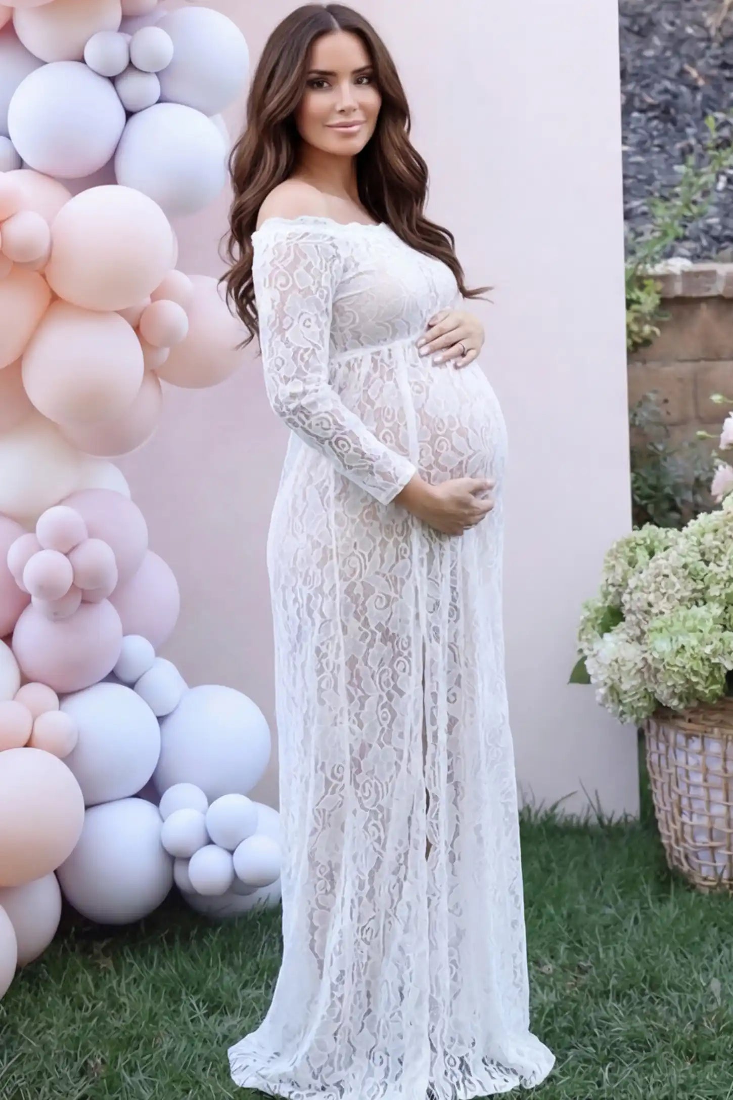 Lace Long Sleeve Maternity Photoshoot Dress Lace Long Sleeve Maternity Gown in white featuring scalloped lace trim neckline on pregnant woman during indoor photoshoot showing front.