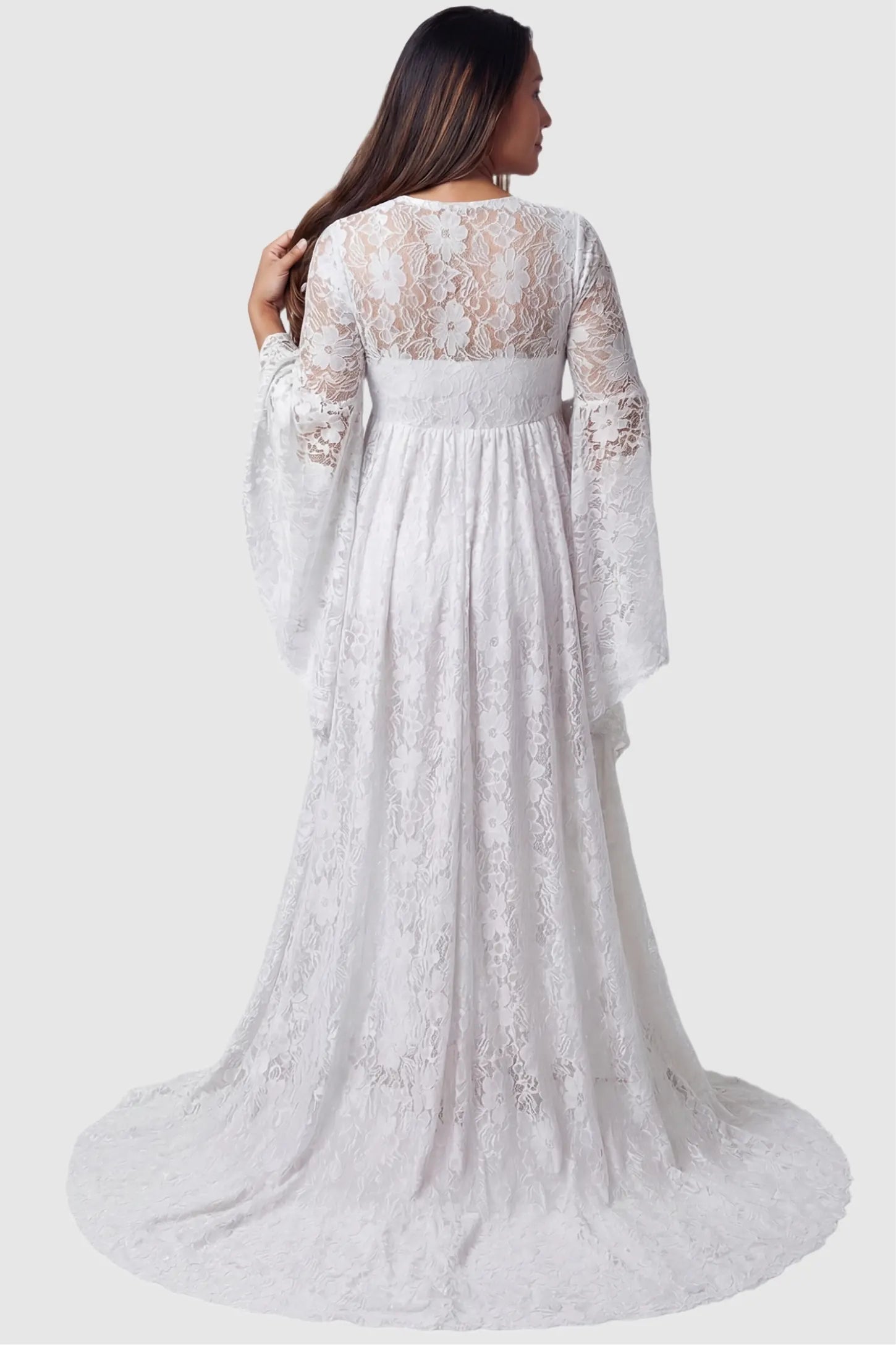 Lace Flare Long Sleeve Maternity Photoshoot Gown Back view of the Lace Flare Long Sleeve Maternity Photoshoot Gown in White featuring an elegant sweeping train on a pregnant model.