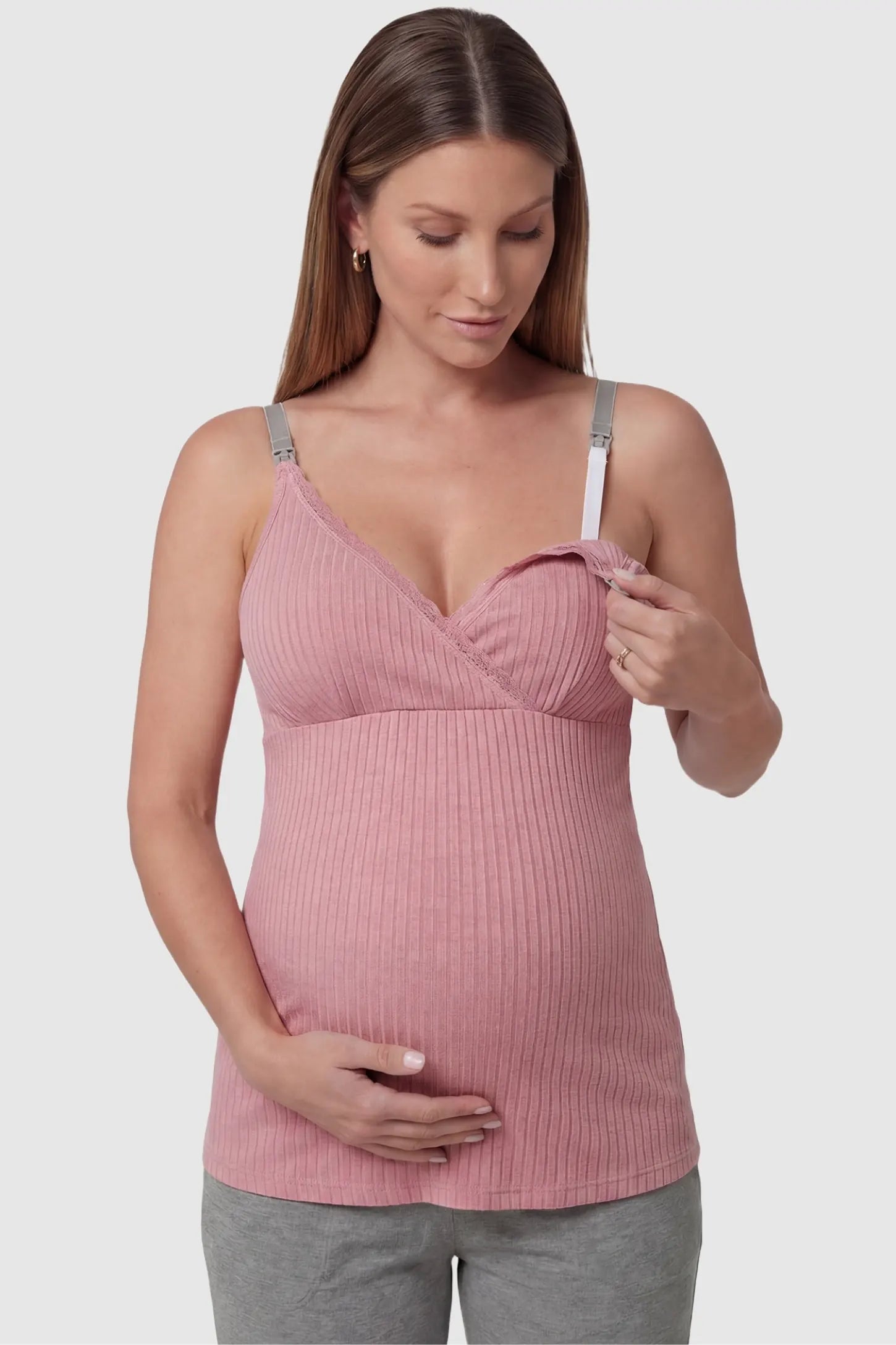 Padded Ribbed Maternity & Nursing Camisole Dusty Pink Padded Ribbed Maternity Camisole with easy nursing access on a pregnant model in a front view.