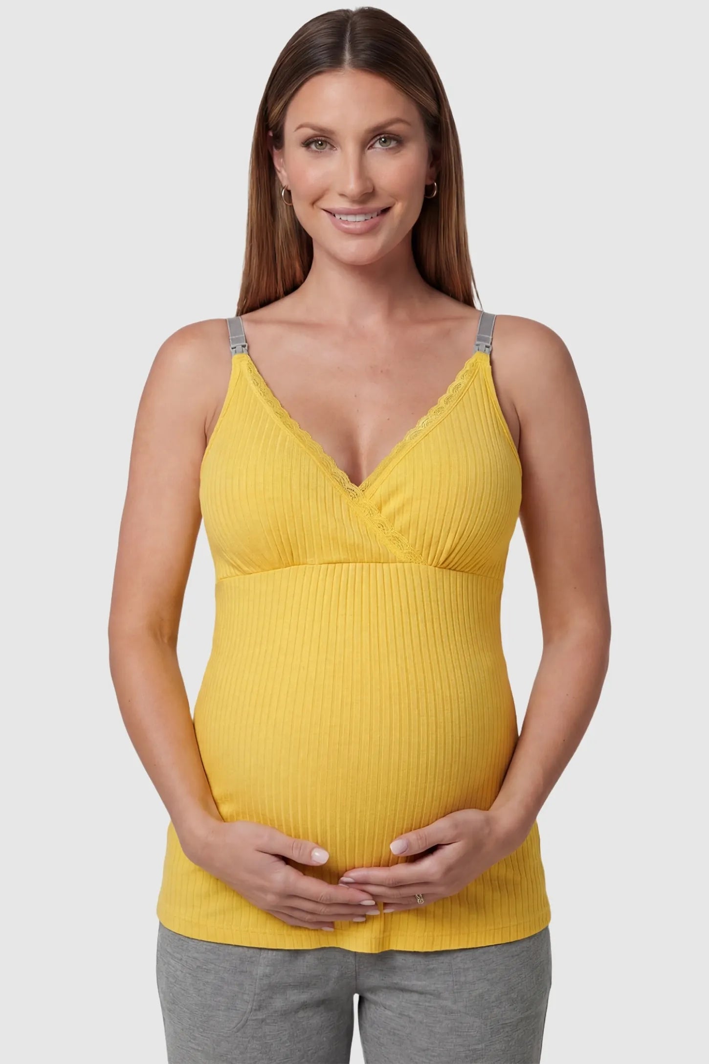 Yellow Padded Ribbed Maternity Camisole with lace-trim V-neckline on a pregnant model in a front view.