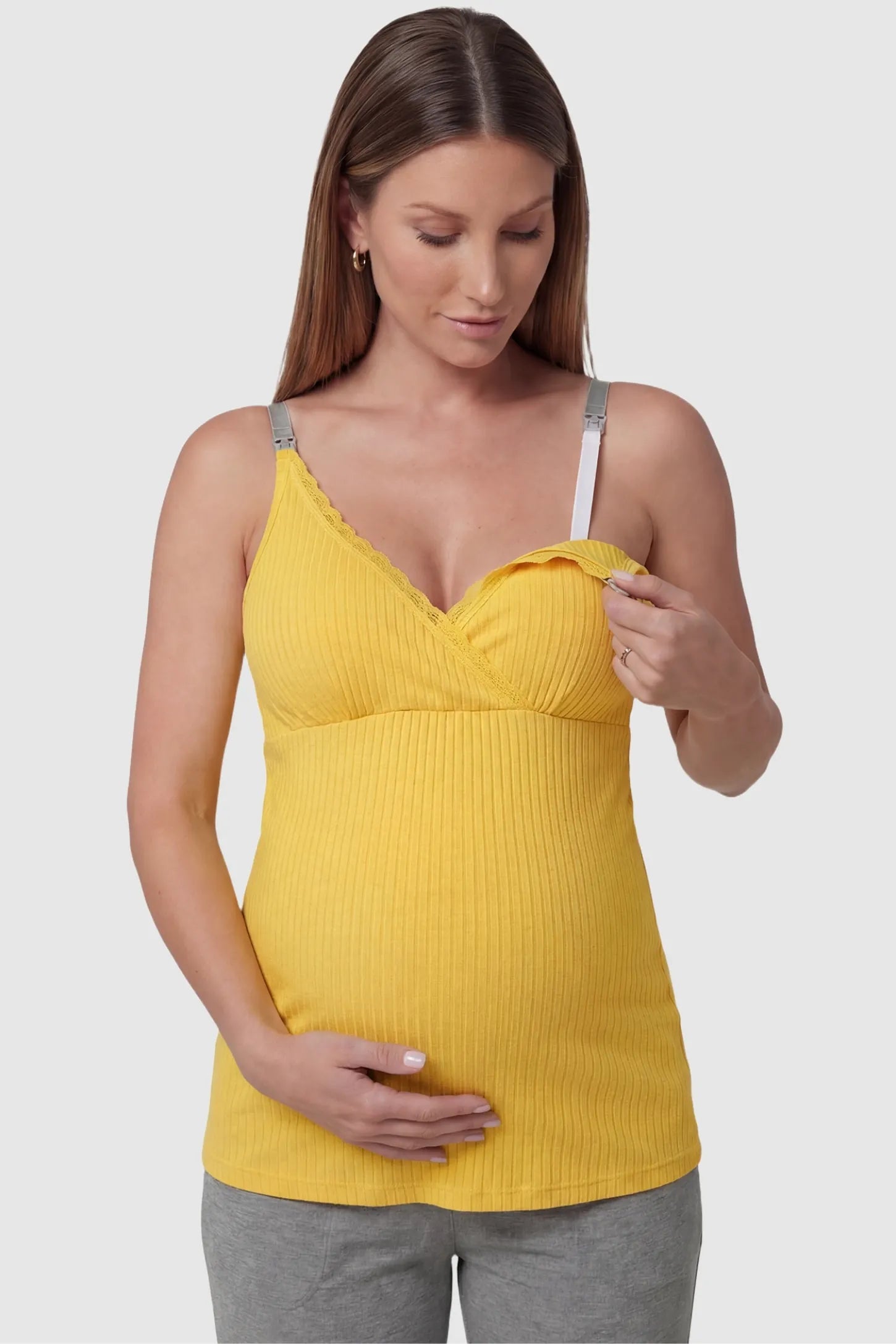 Padded Ribbed Maternity & Nursing Camisole Yellow Padded Ribbed Maternity Camisole with easy nursing access on a pregnant model in a front view.