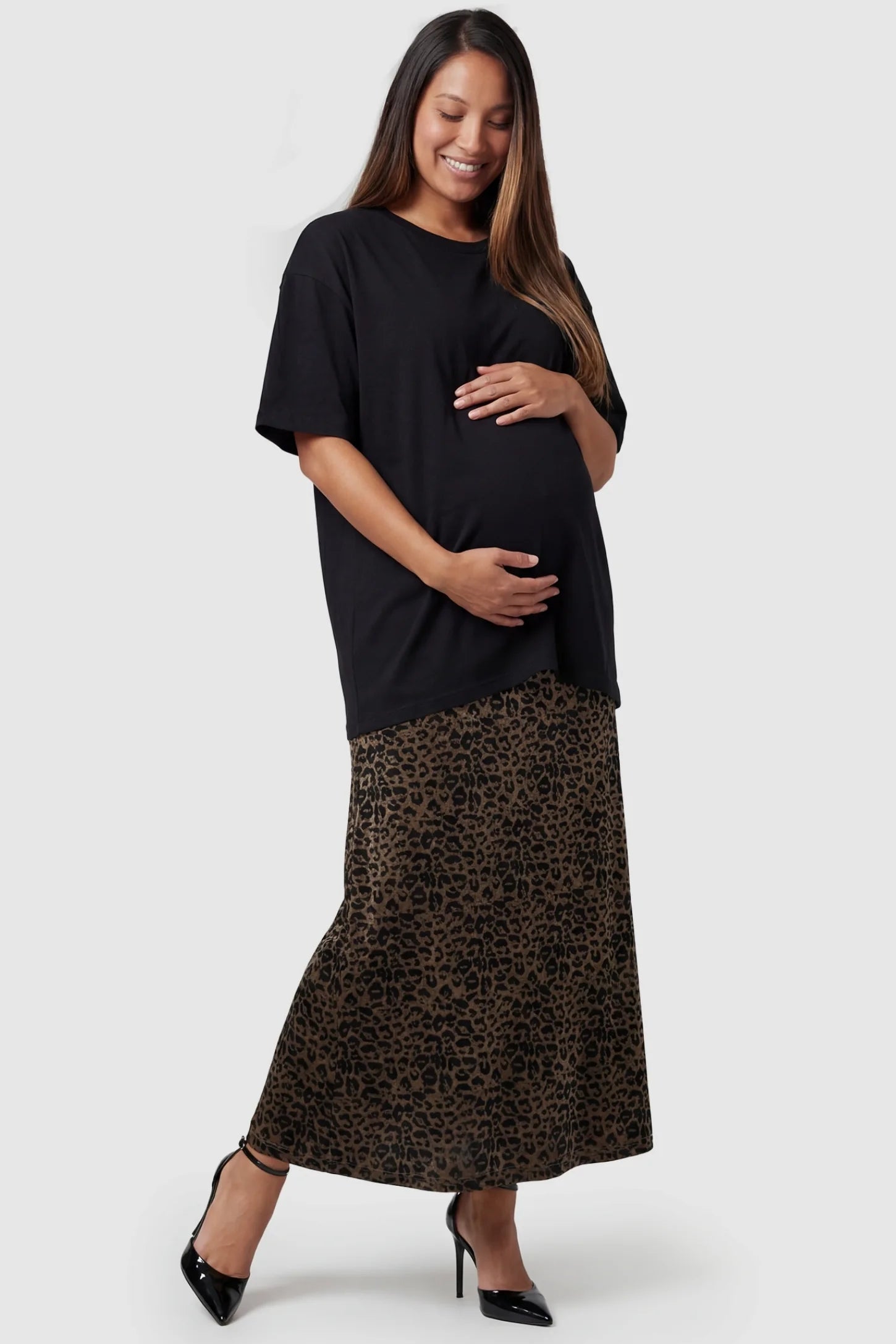 Leopard Print Velvet High-Waisted Maternity Maxi Skirt in Coffee full body view featuring luxurious velvet fabric on a pregnant model.