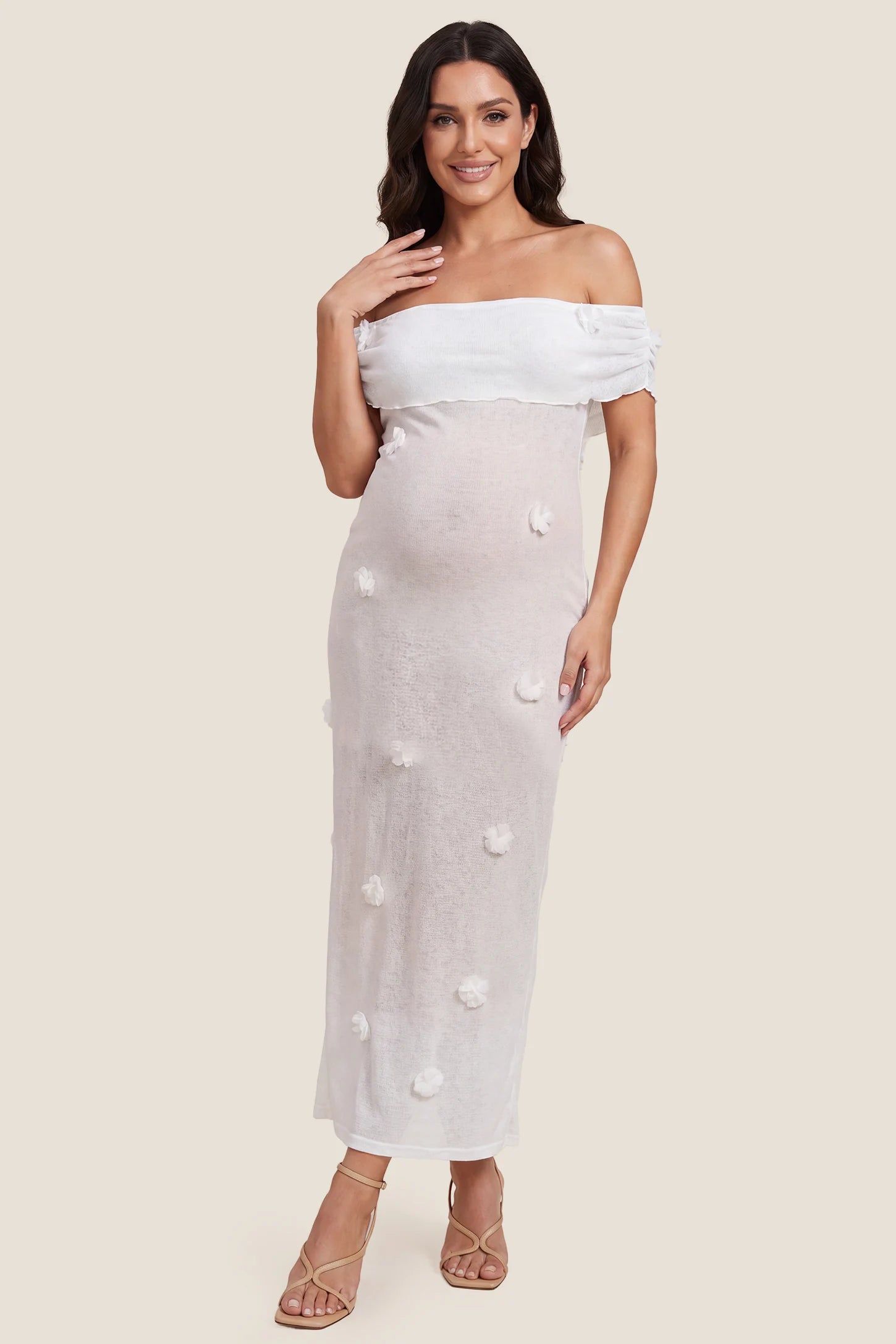3D Floral Off-Shoulder Maternity Dress 3D Floral Off-Shoulder Maternity Dress in Pure White featuring a fold-over neckline, front view on a pregnant model.