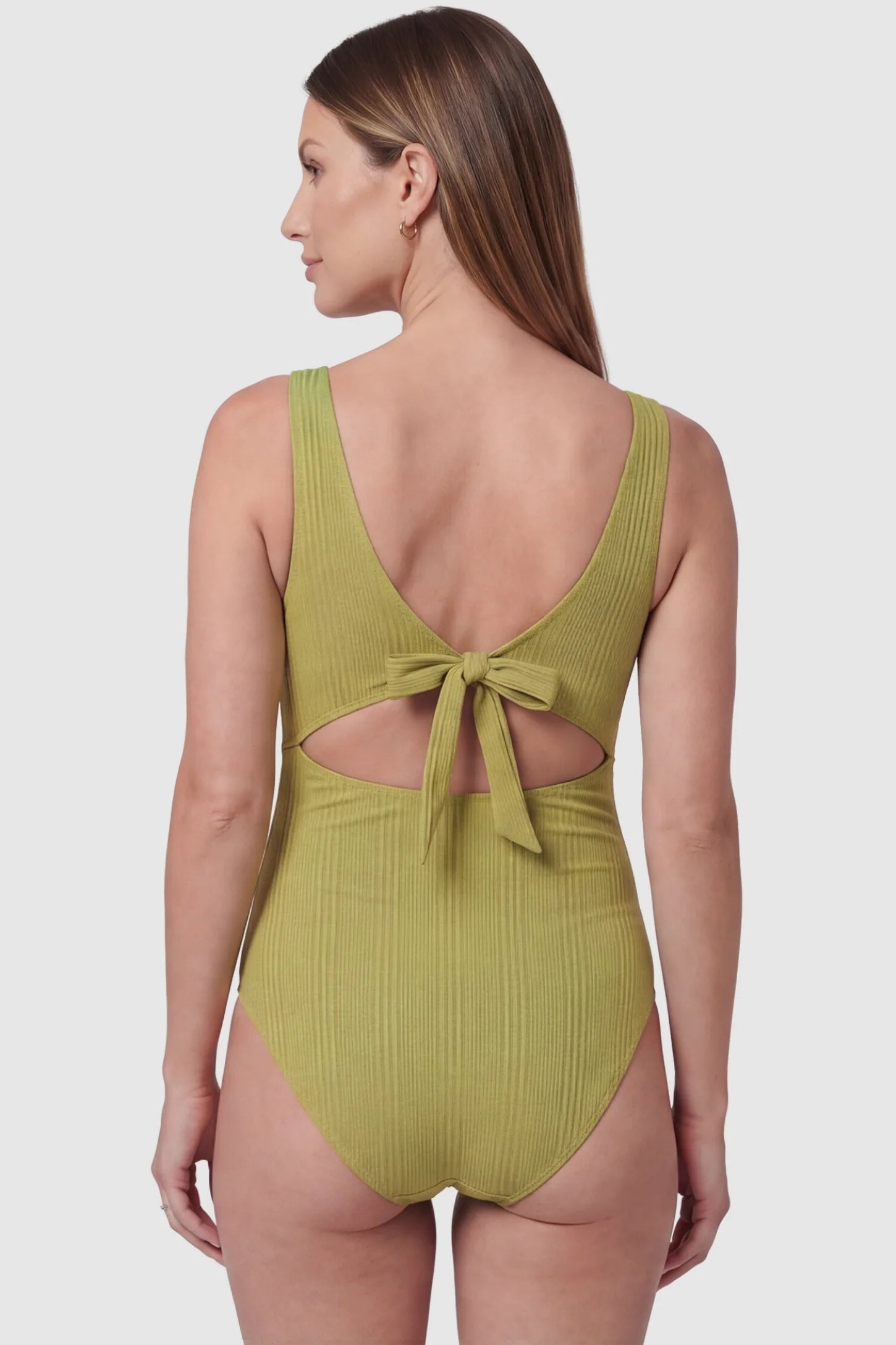 Cutout V-Neck Maternity Swimsuit Cutout V-Neck Maternity Swimsuit in Matcha featuring a back view of the backless silhouette on a pregnant model.