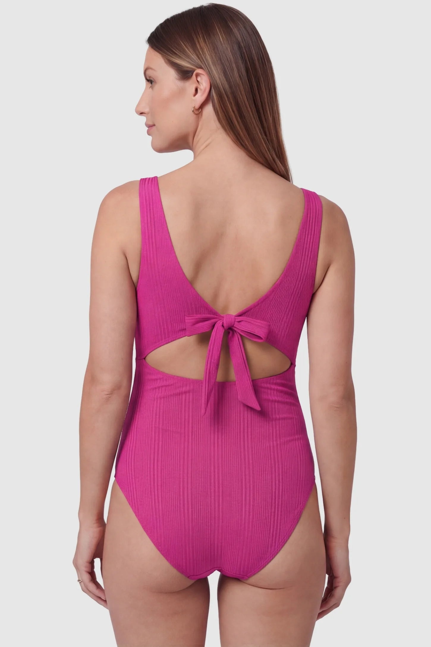 Cutout V-Neck Maternity Swimsuit Cutout V-Neck Maternity Swimsuit in Rose Red featuring a back view of the open-back tie design on a pregnant model.