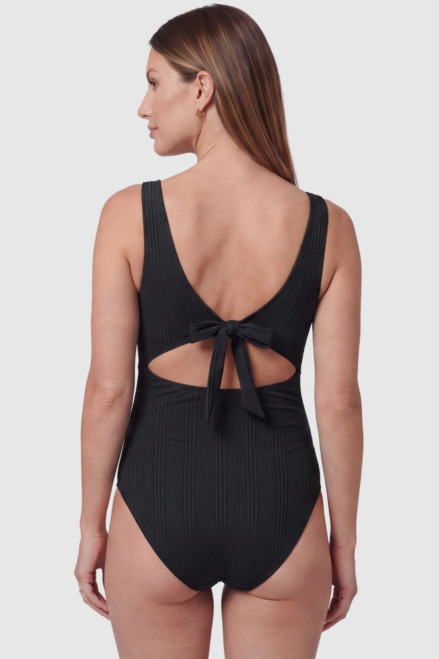 Cutout V-Neck Maternity Swimsuit Cutout V-Neck Maternity Swimsuit in Black featuring a timeless backless design on a pregnant model.