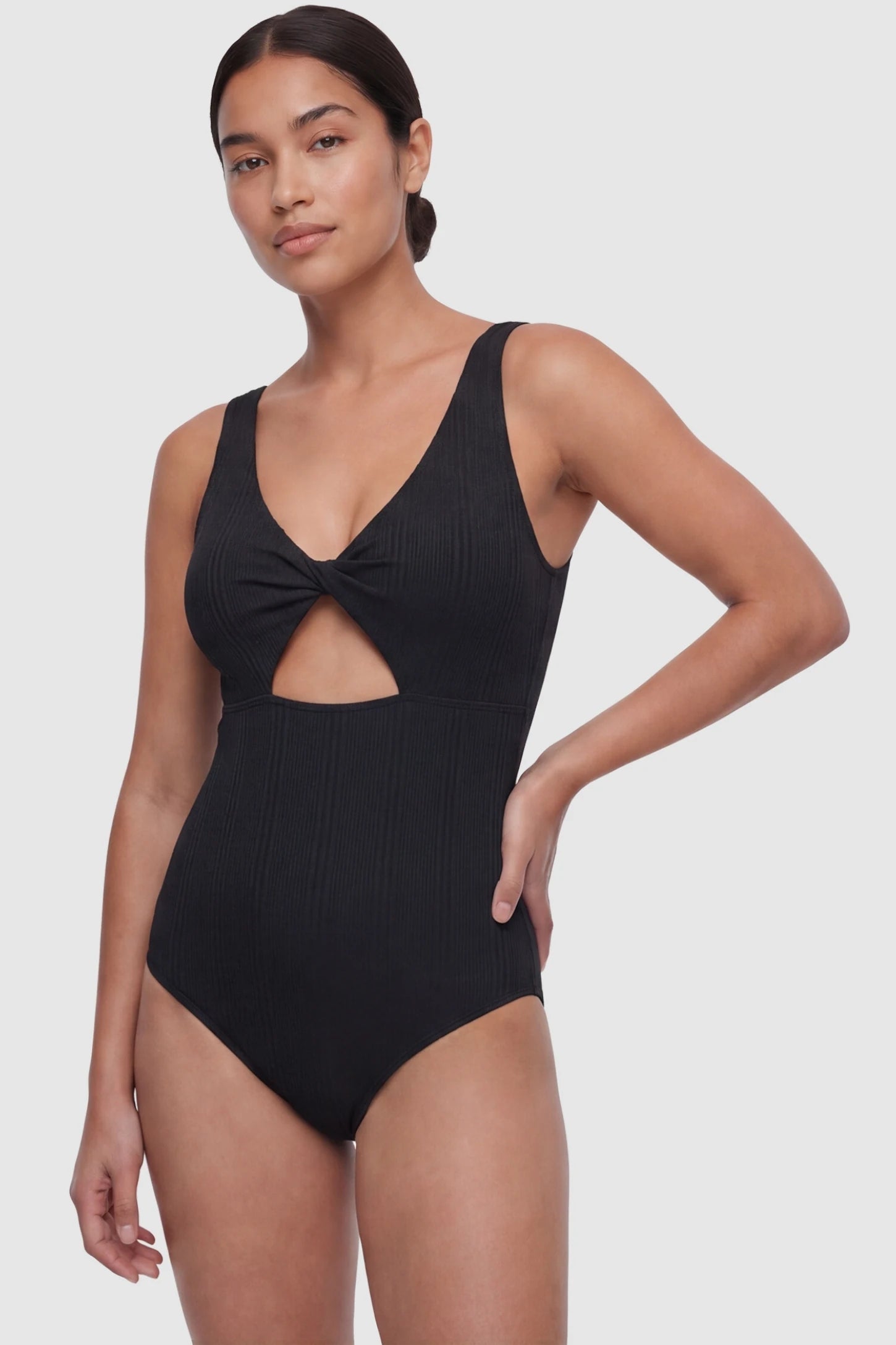 Cutout V-Neck Maternity Swimsuit Cutout V-Neck Maternity Swimsuit in Black featuring a sophisticated front cutout on a postpartum model.