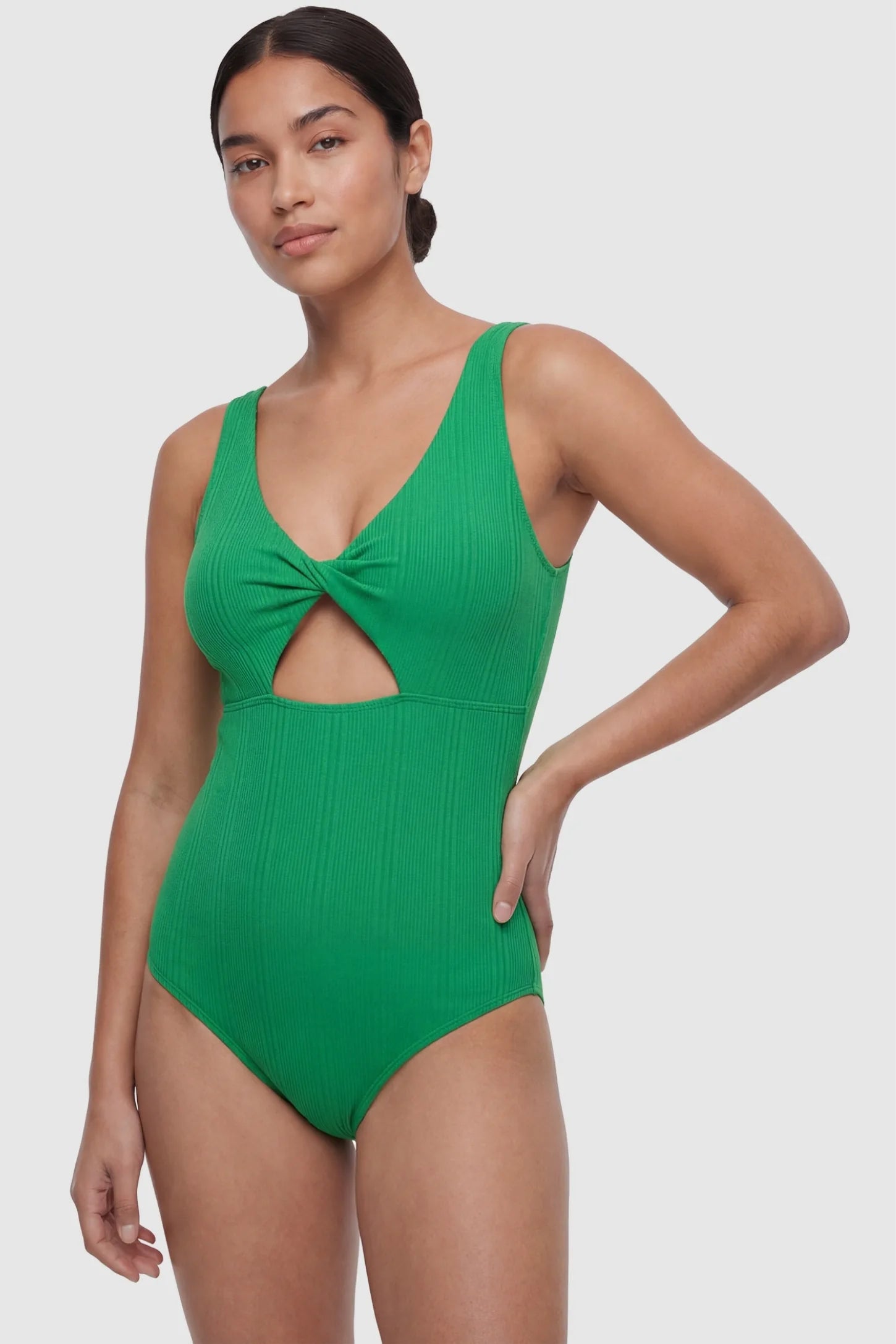 Cutout V-Neck Maternity Swimsuit Cutout V-Neck Maternity Swimsuit in Green featuring a front view of the smooth, flexible bodice on a postpartum model.