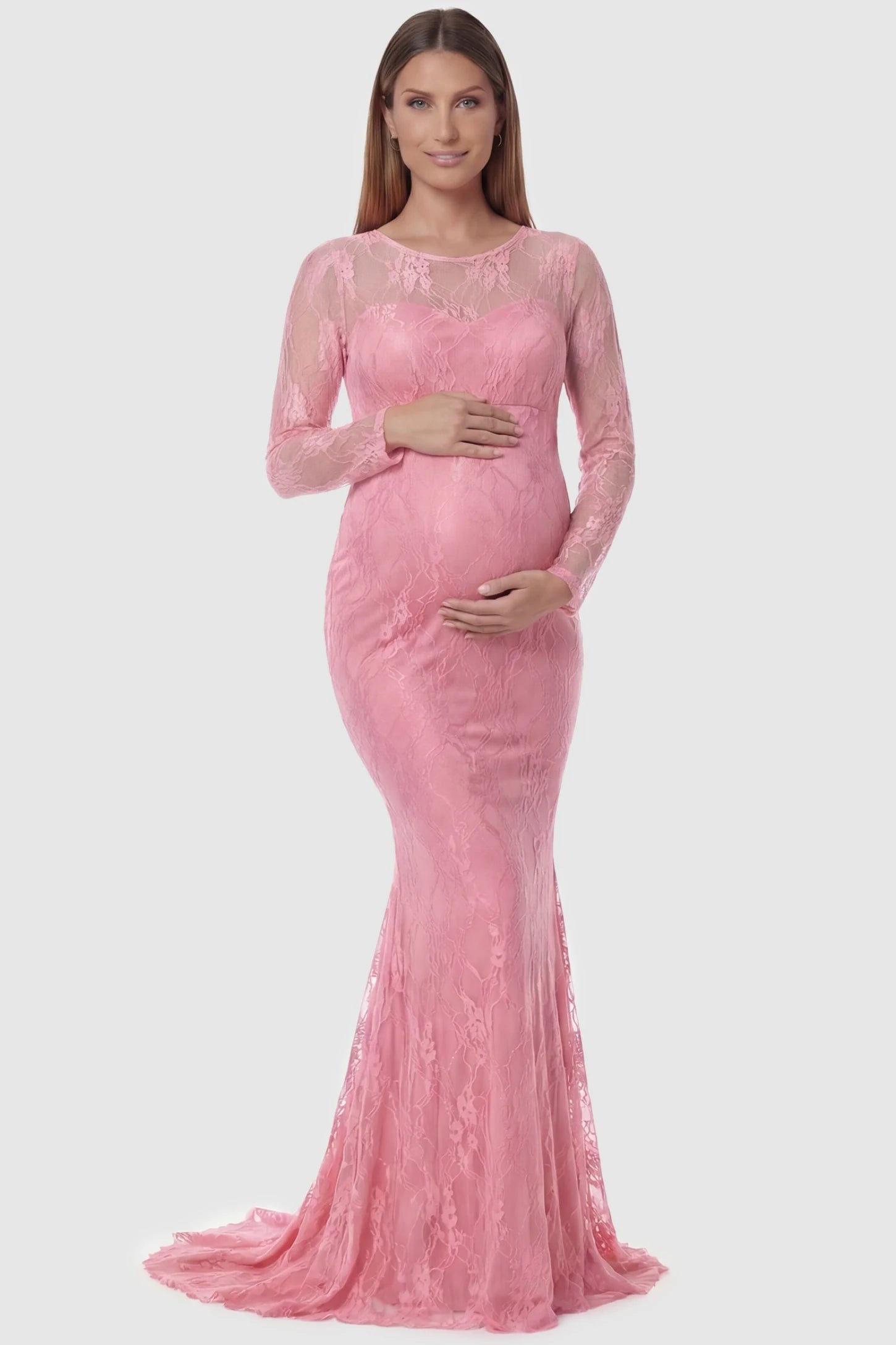 Floral Lace Long Sleeve Trumpet Maternity Photoshoot Gown Floral Lace Long Sleeve Trumpet Maternity Photoshoot Gown in Pink featuring a floor-length hem on a pregnant model.