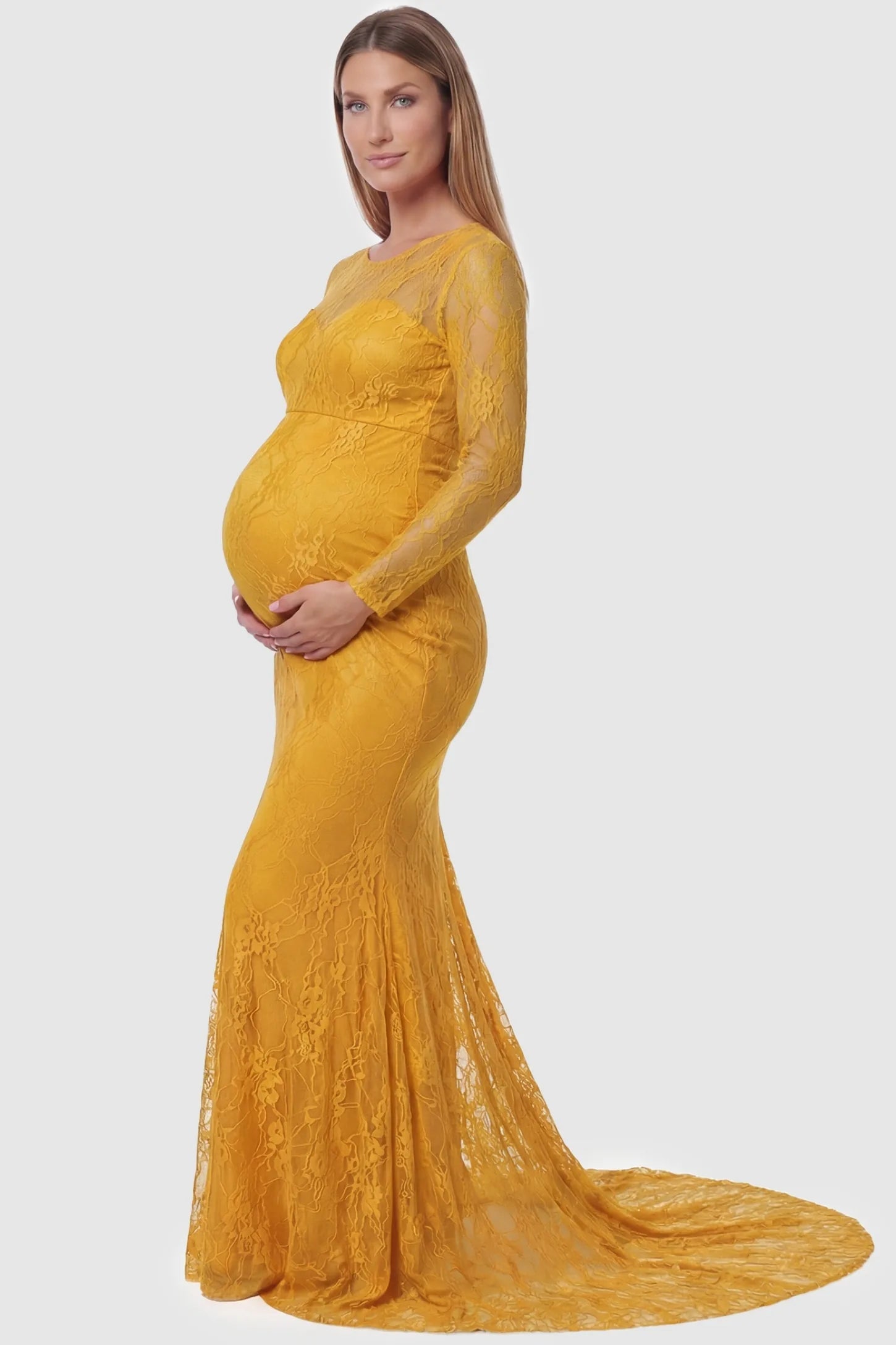 Floral Lace Long Sleeve Trumpet Maternity Photoshoot Gown Floral Lace Long Sleeve Trumpet Maternity Photoshoot Gown in Yellow featuring a curve-hugging fit on a pregnant model.