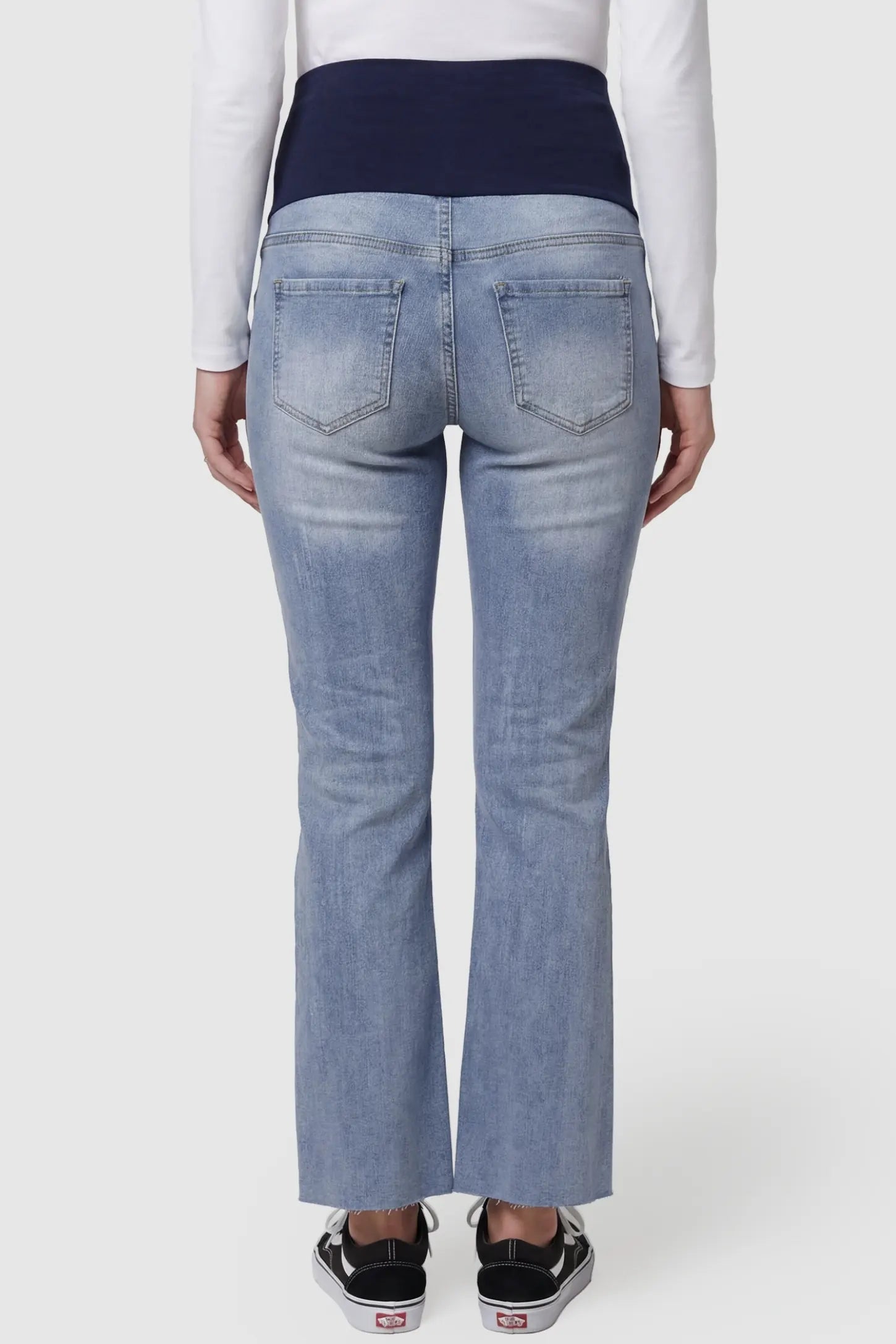 Knee Slit Wide Leg Maternity Jeans Knee Slit Wide Leg Maternity Jeans in Blue denim featuring classic rear pockets and a supportive waistband back view on a pregnant model.