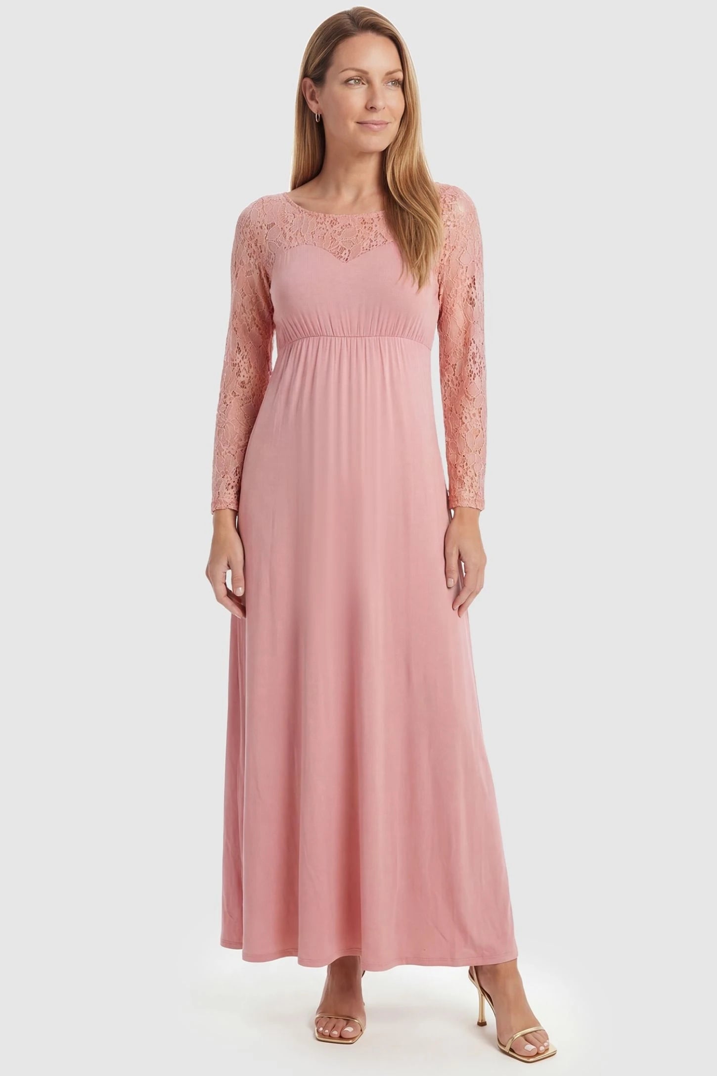 Acrylic Lace Long Sleeve Floor-Length Maternity Dress Acrylic Lace Long Sleeve Floor-Length Maternity Dress in Pink featuring a round neck on a front-facing non-pregnant model.