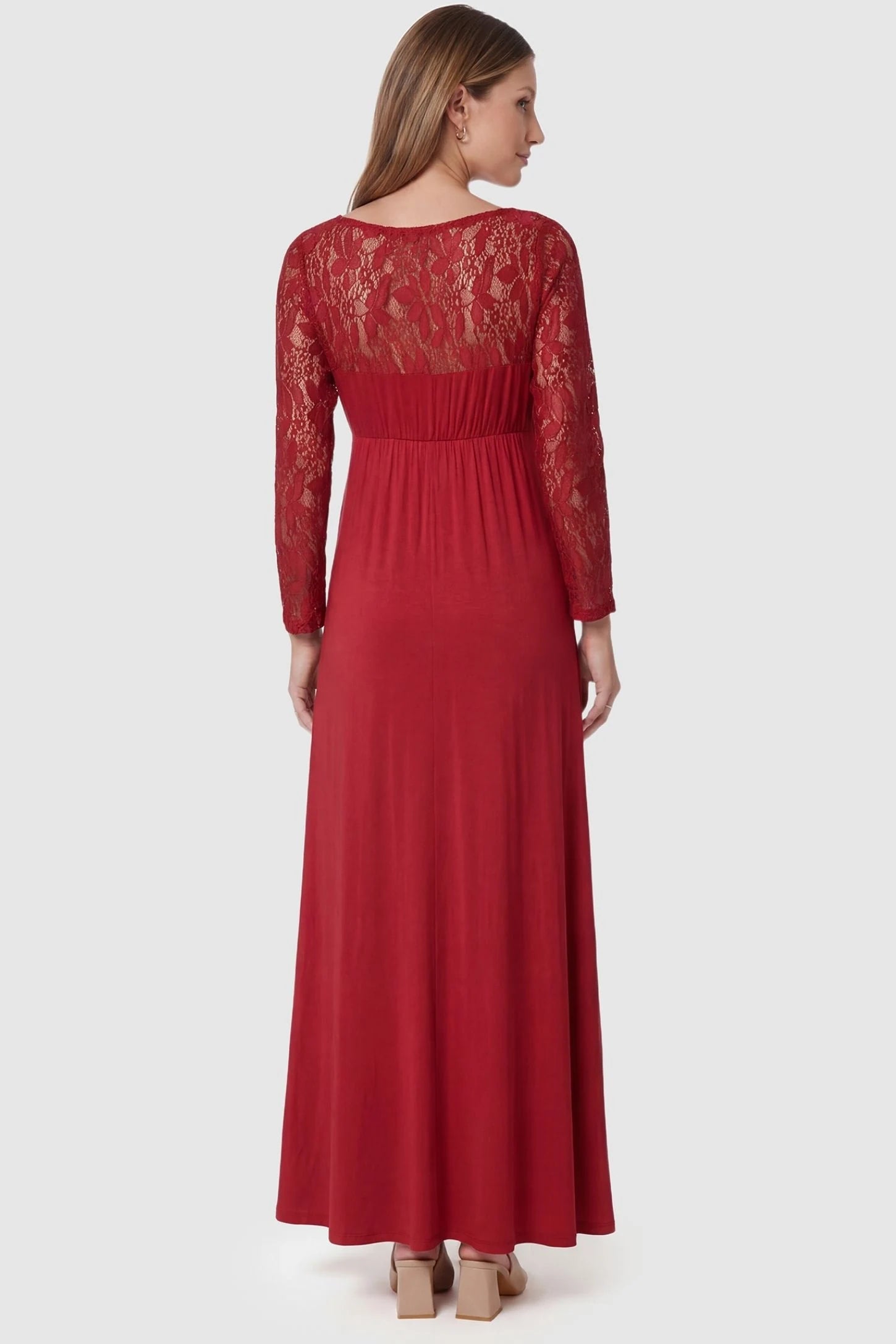 Acrylic Lace Long Sleeve Floor-Length Maternity Dress Acrylic Lace Long Sleeve Floor-Length Maternity Dress in Red featuring a sheer lace back on a pregnant model, back view.