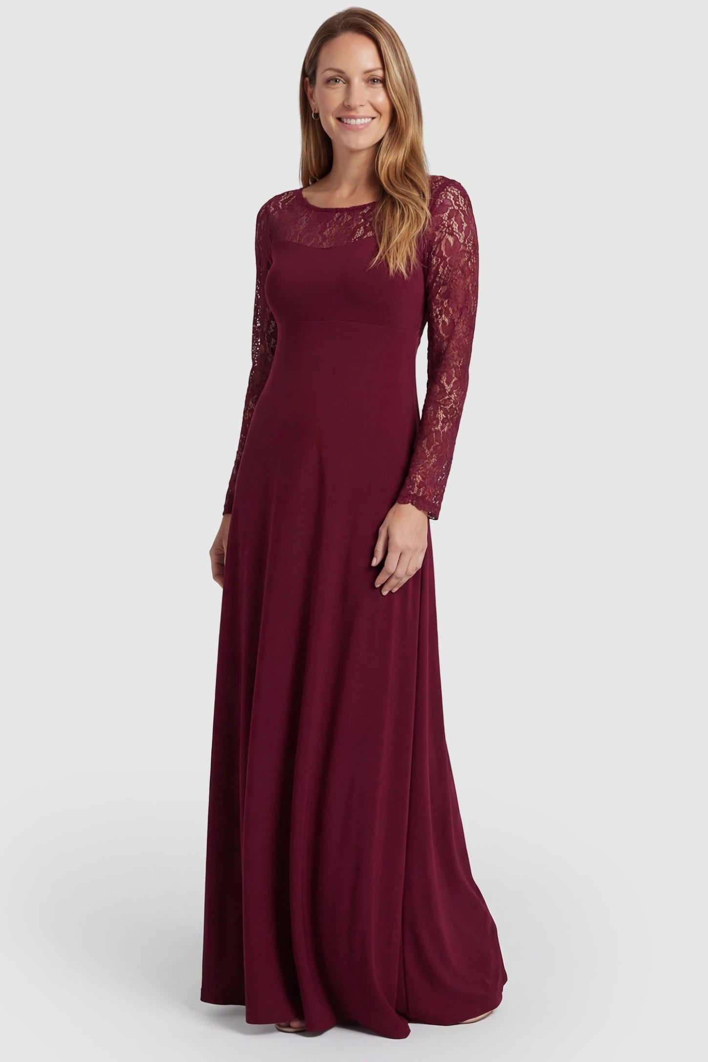 Acrylic Lace Long Sleeve Floor-Length Maternity Dress Acrylic Lace Long Sleeve Floor-Length Maternity Dress in Wine Red featuring a round neck on a front-facing non-pregnant model.