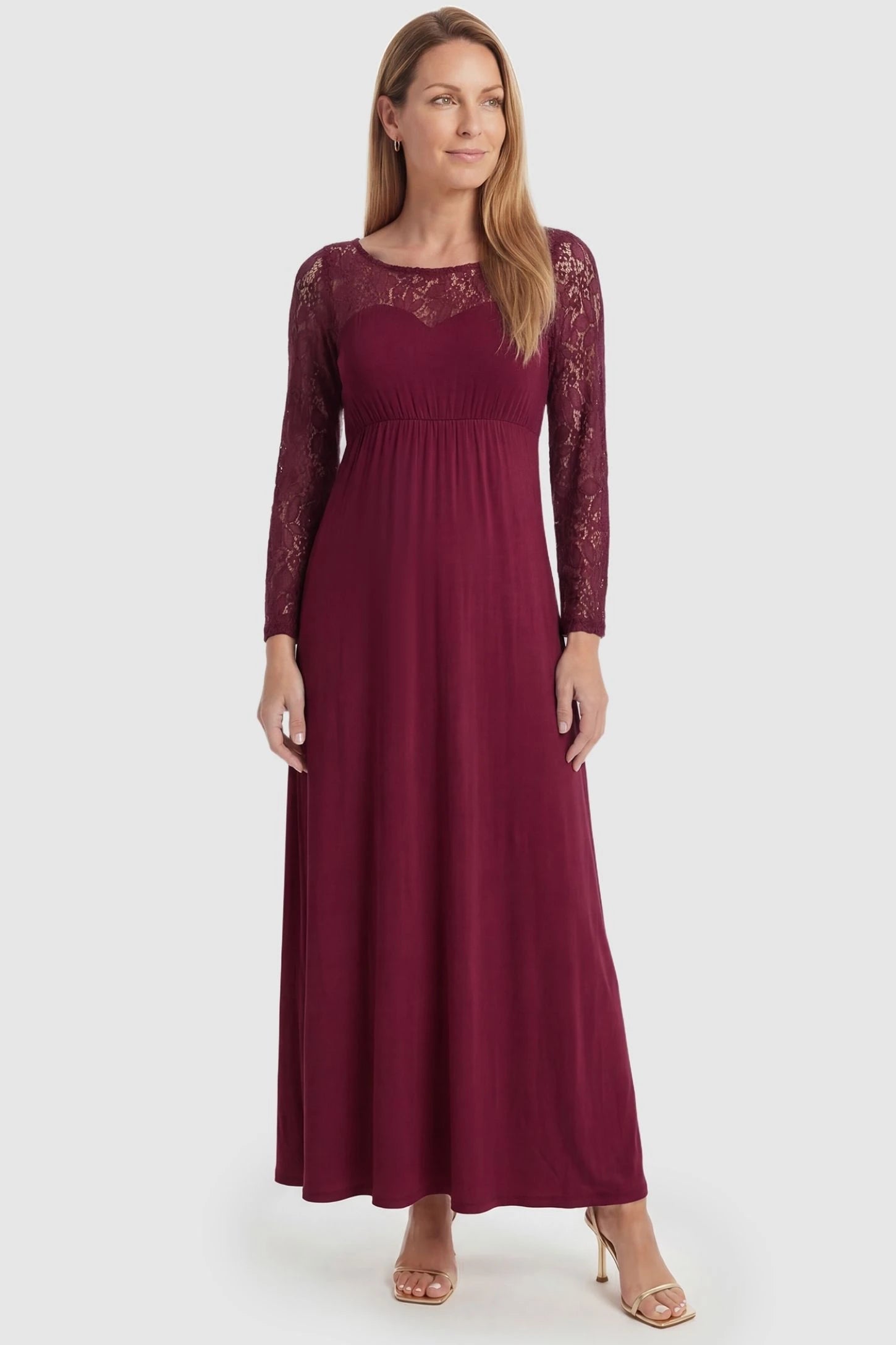 Acrylic Lace Long Sleeve Floor-Length Maternity Dress Acrylic Lace Long Sleeve Floor-Length Maternity Dress in Wine Red featuring a round neck on a front-facing non-pregnant model.