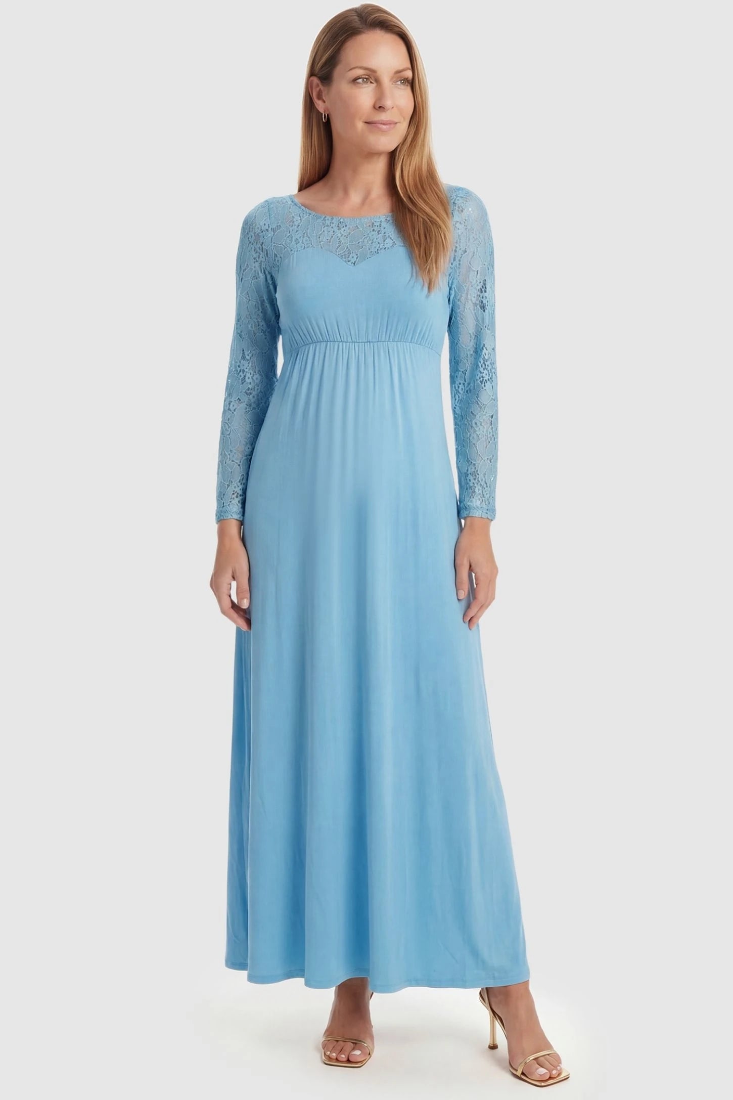 Acrylic Lace Long Sleeve Floor-Length Maternity Dress Acrylic Lace Long Sleeve Floor-Length Maternity Dress in Light Blue featuring an elastic waist on a front-facing non-pregnant model.