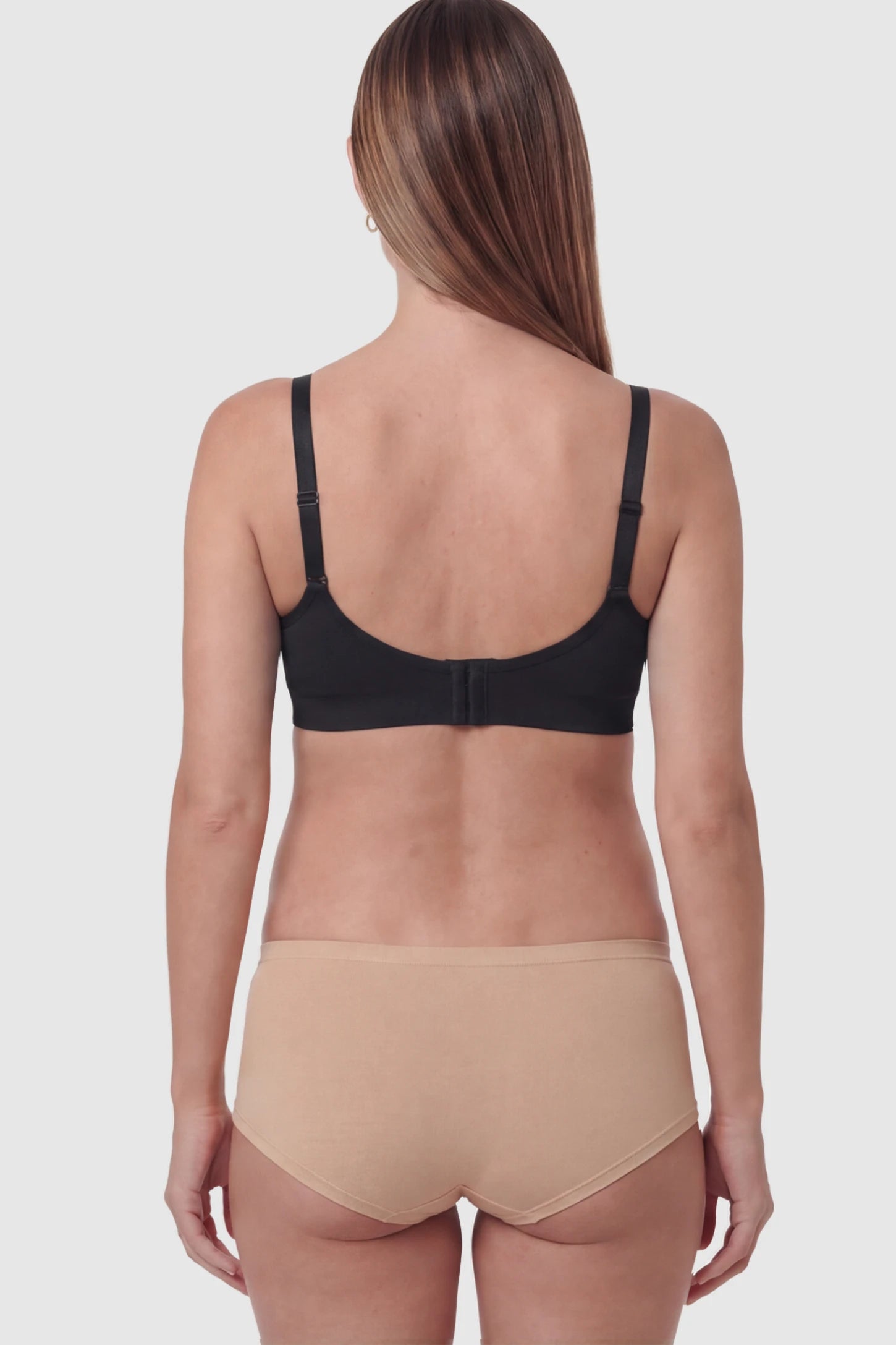 Seamless Ruched Front Wireless Maternity Nursing Bra Seamless Ruched Wireless Nursing Bra in Black with on a pregnant model.