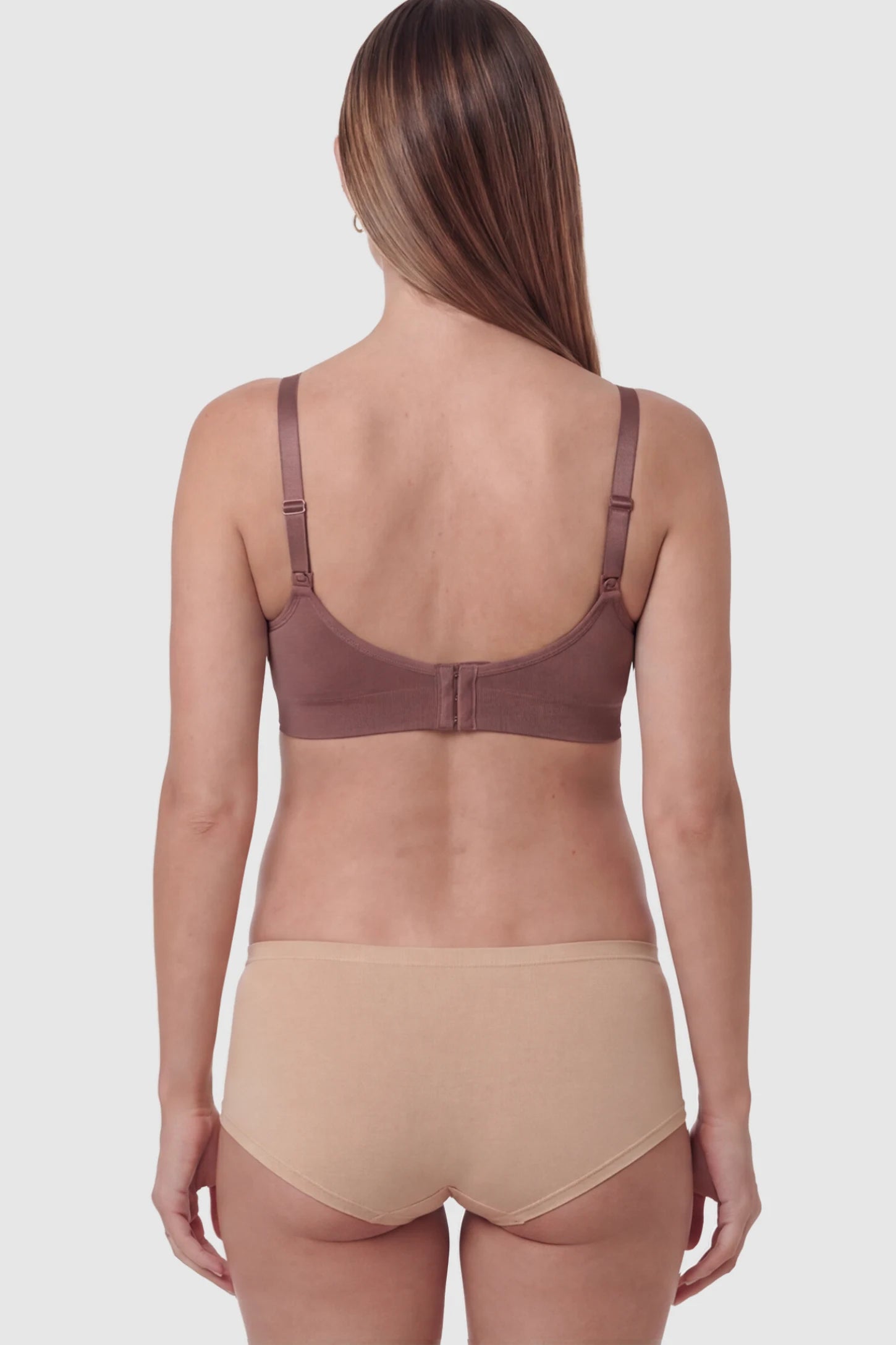 Seamless Ruched Front Wireless Maternity Nursing Bra Seamless Ruched Wireless Nursing Bra in Light Brown Red on a pregnant model.
