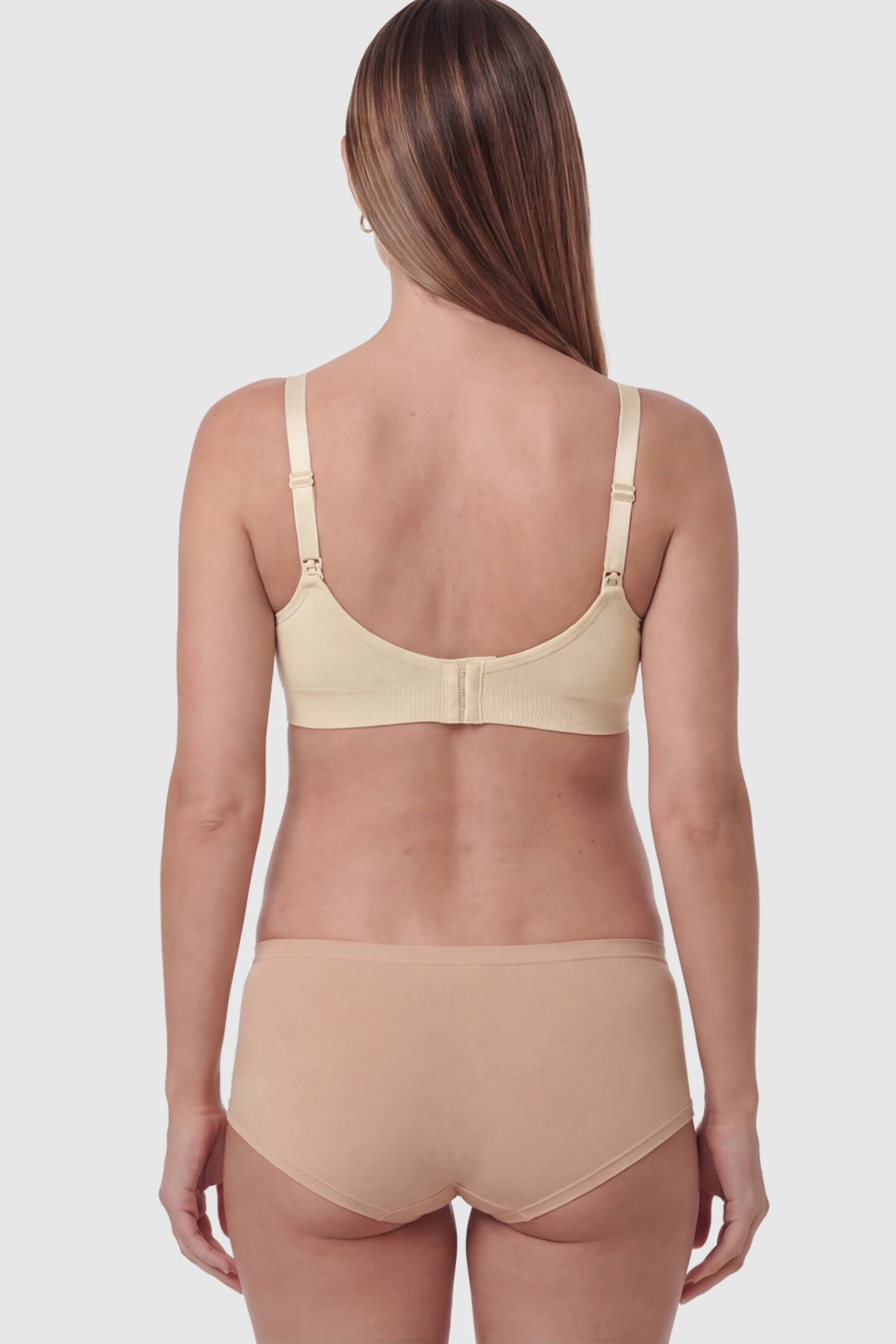 Seamless Ruched Front Wireless Maternity Nursing Bra Seamless Ruched Wireless Nursing Bra in Skin on a pregnant model.