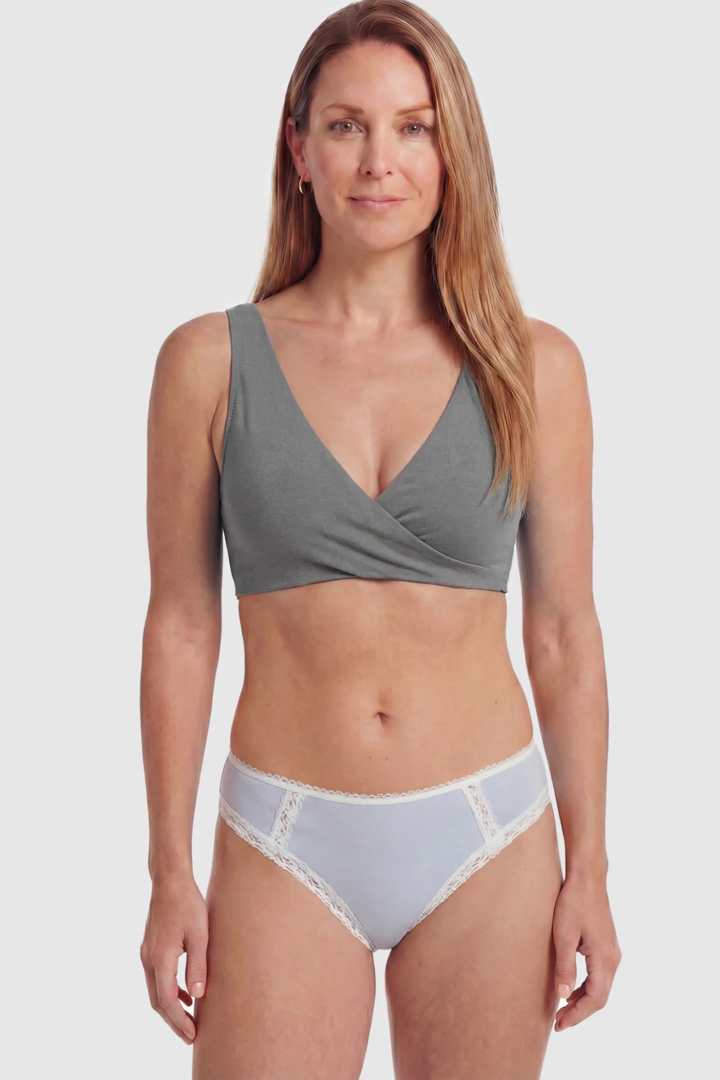 Cotton Blend Crossover Maternity Nursing Bra Cotton Blend Crossover Maternity Nursing Bra in Dark Gray featuring a wire-free wrap front on a postpartum model.