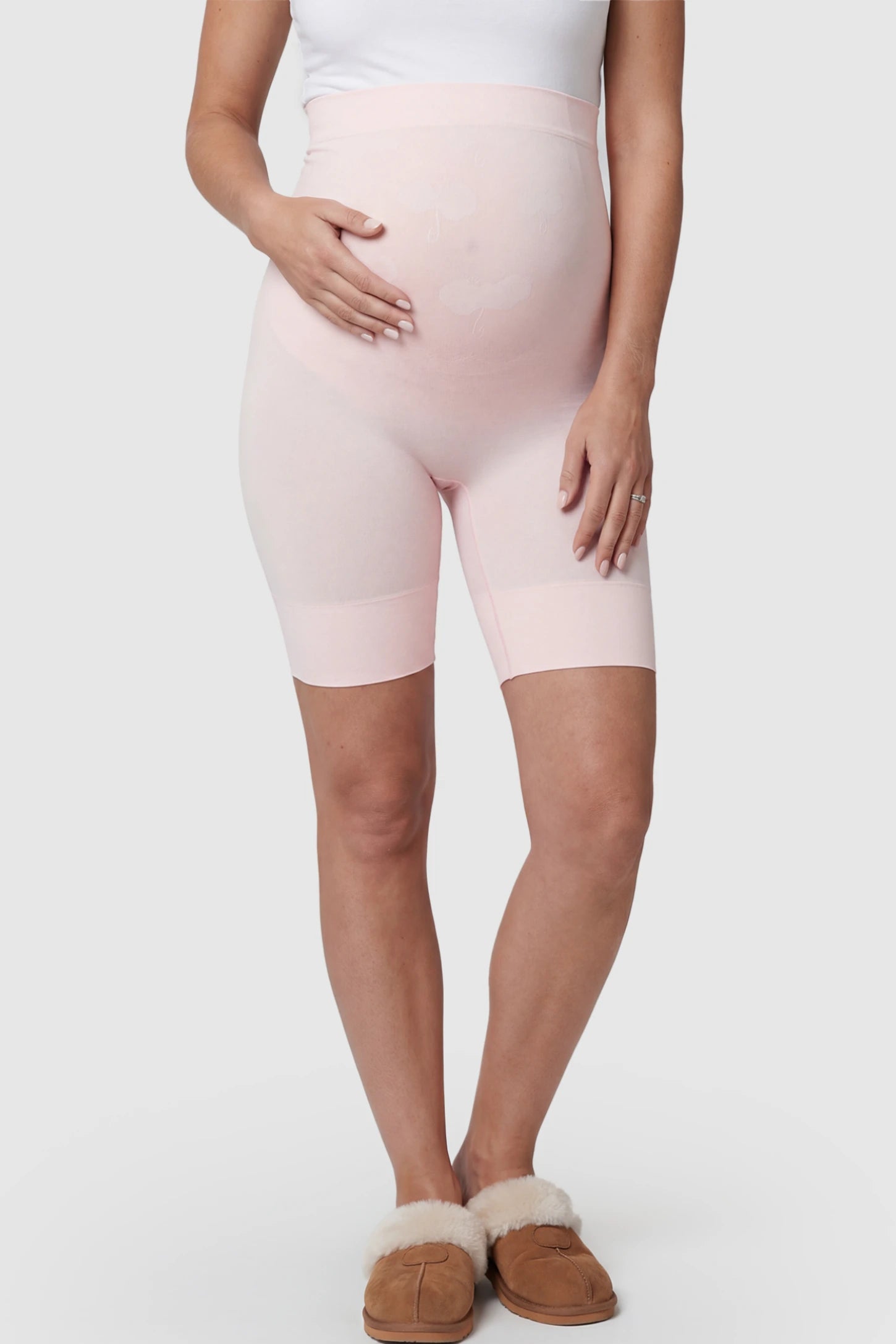 Seamless High Waist Support Maternity Shapewear Shorts Seamless High Waist Support Maternity Shapewear Shorts in pink Color featuring over-the-belly panel on a pregnant model.