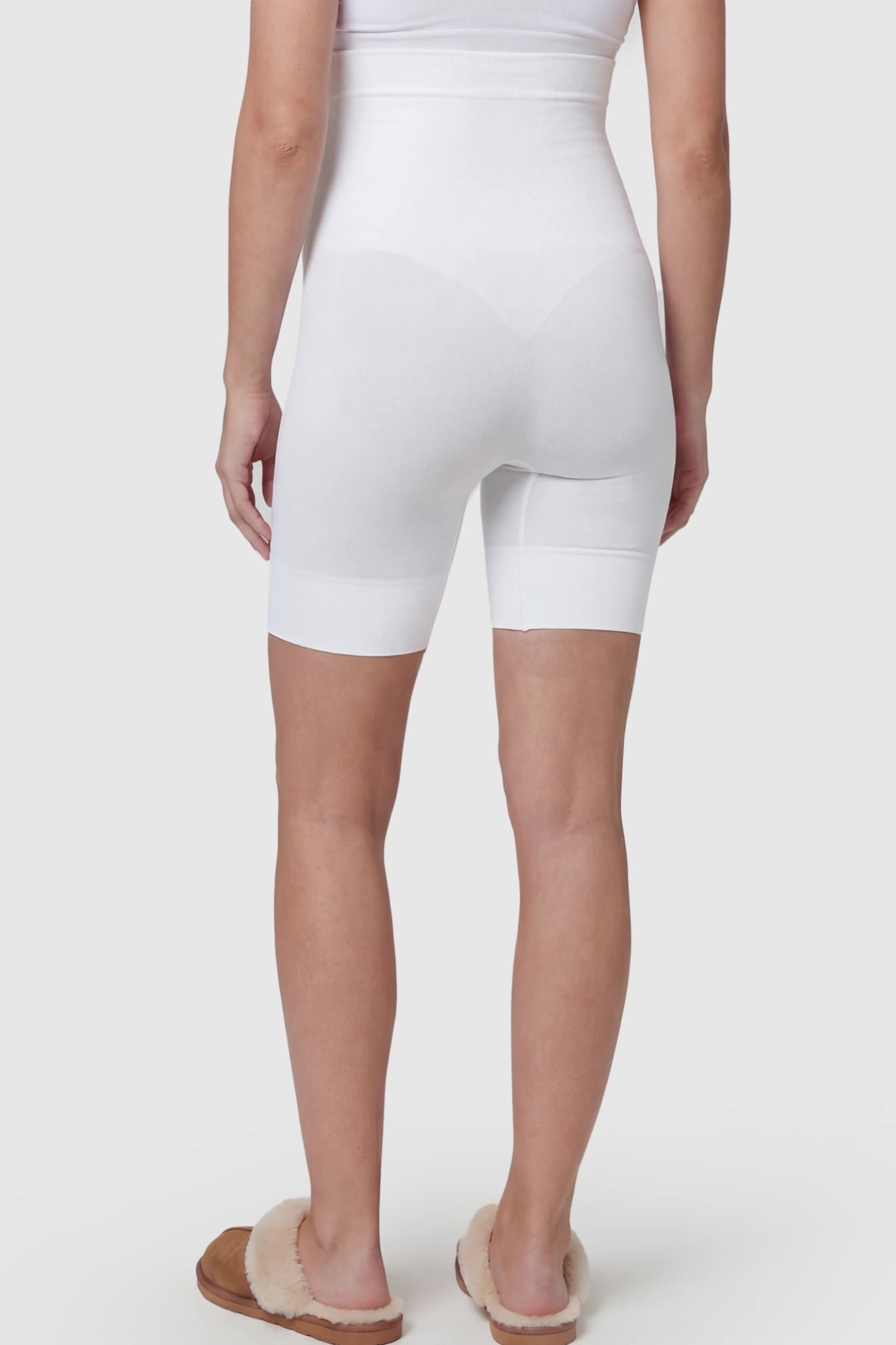 Seamless High Waist Support Maternity Shapewear Shorts Seamless High Waist Support Maternity Shapewear Shorts in White Color on a pregnant model.