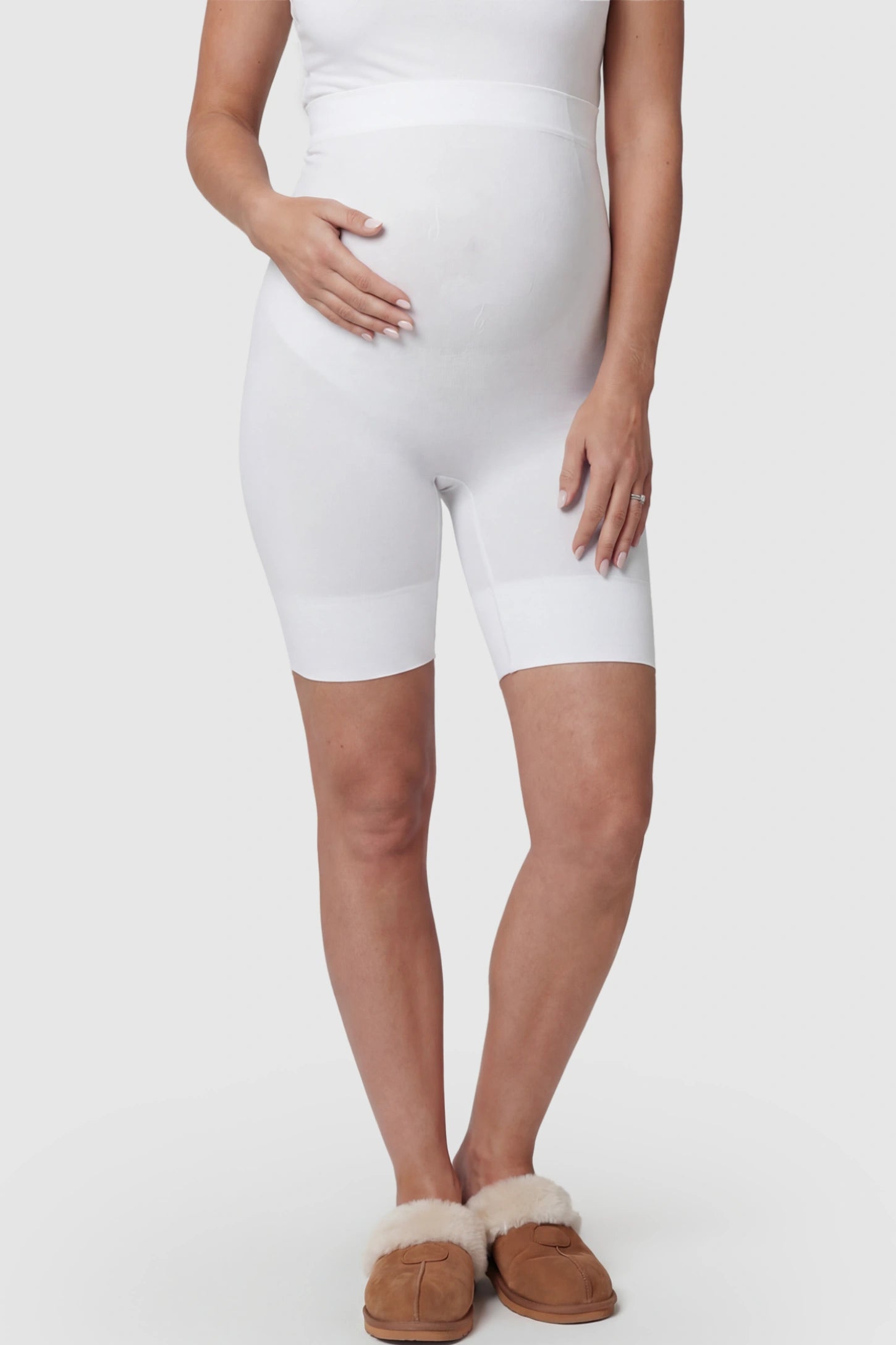 Seamless High Waist Support Maternity Shapewear Shorts Seamless High Waist Support Maternity Shapewear Shorts in White Color featuring over-the-belly panel on a pregnant model.