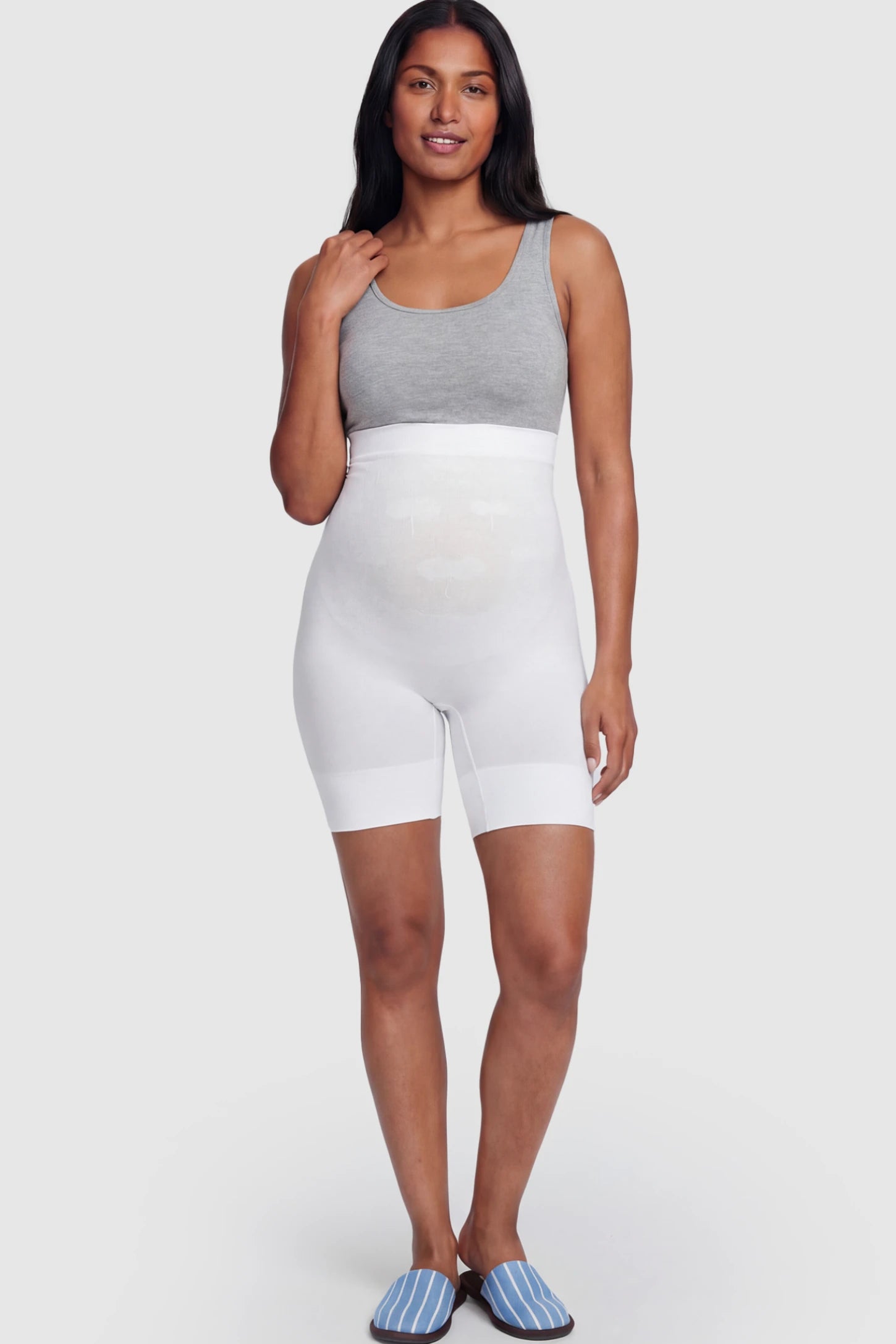 Seamless High Waist Support Maternity Shapewear Shorts Seamless High Waist Support Maternity Shapewear Shorts in White Color featuring over-the-belly panel on a postpartum model.