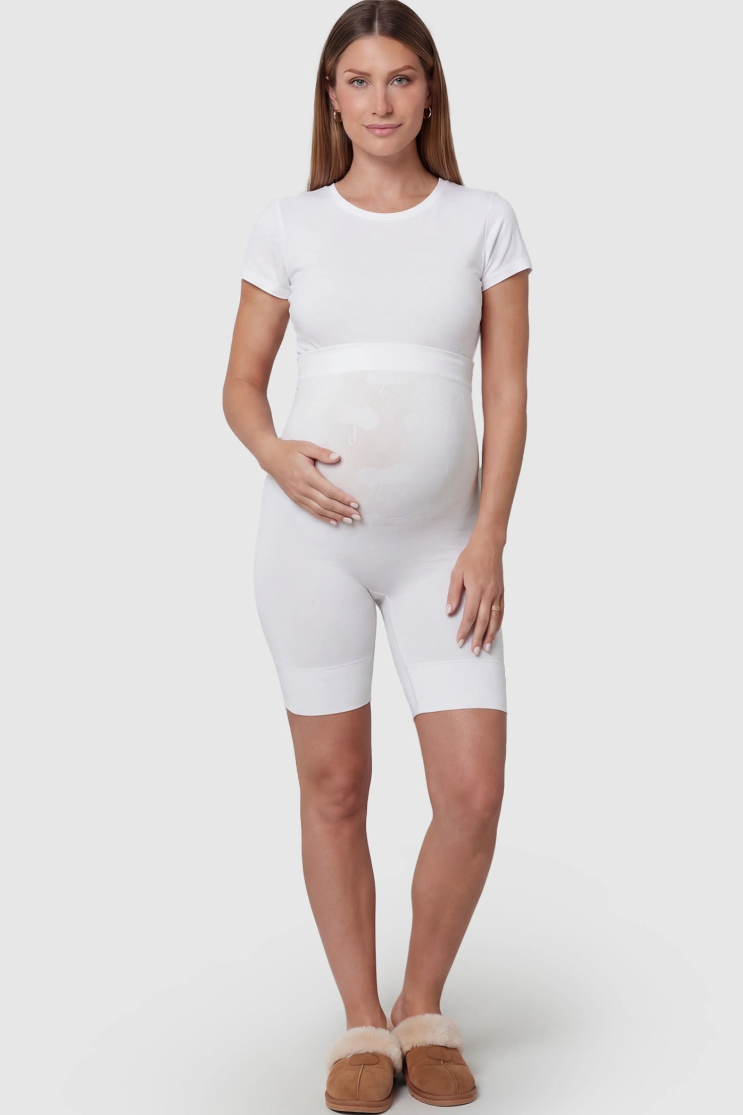 Seamless High Waist Support Maternity Shapewear Shorts Seamless High Waist Support Maternity Shapewear Shorts in White Color featuring over-the-belly panel on a pregnant model.