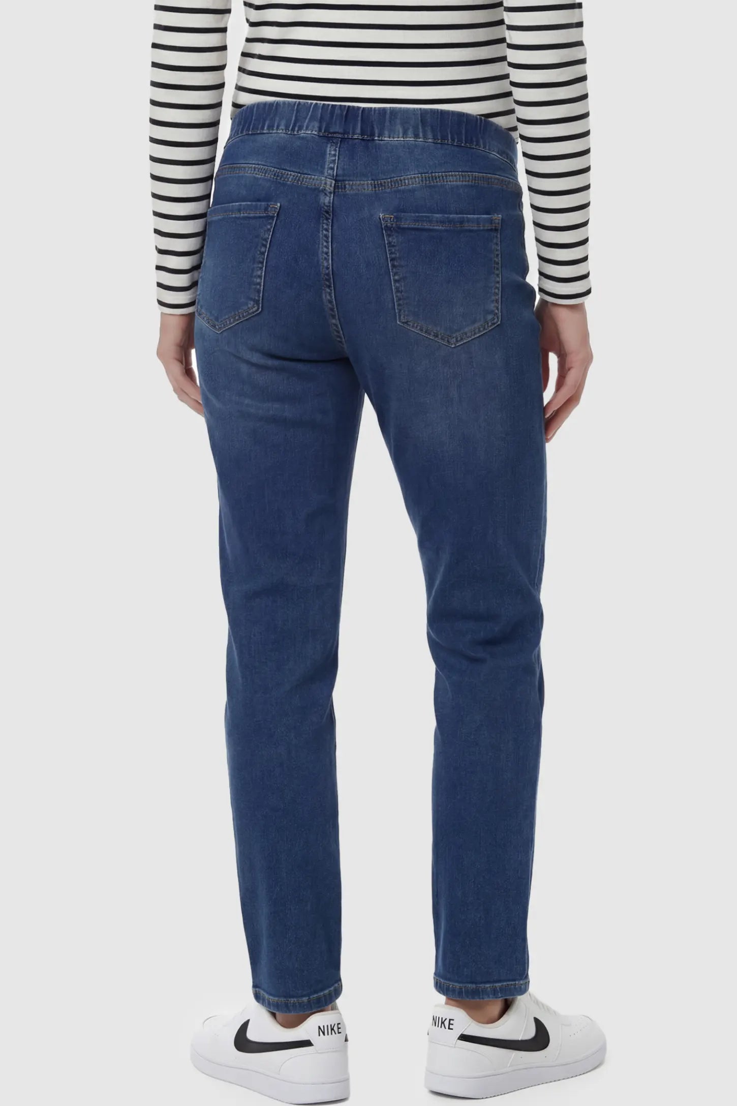 Adjustable Elastic Waist Straight Leg Maternity Jeans Adjustable Elastic Waist Straight Leg Maternity Jeans in Vintage Blue on a pregnant model.