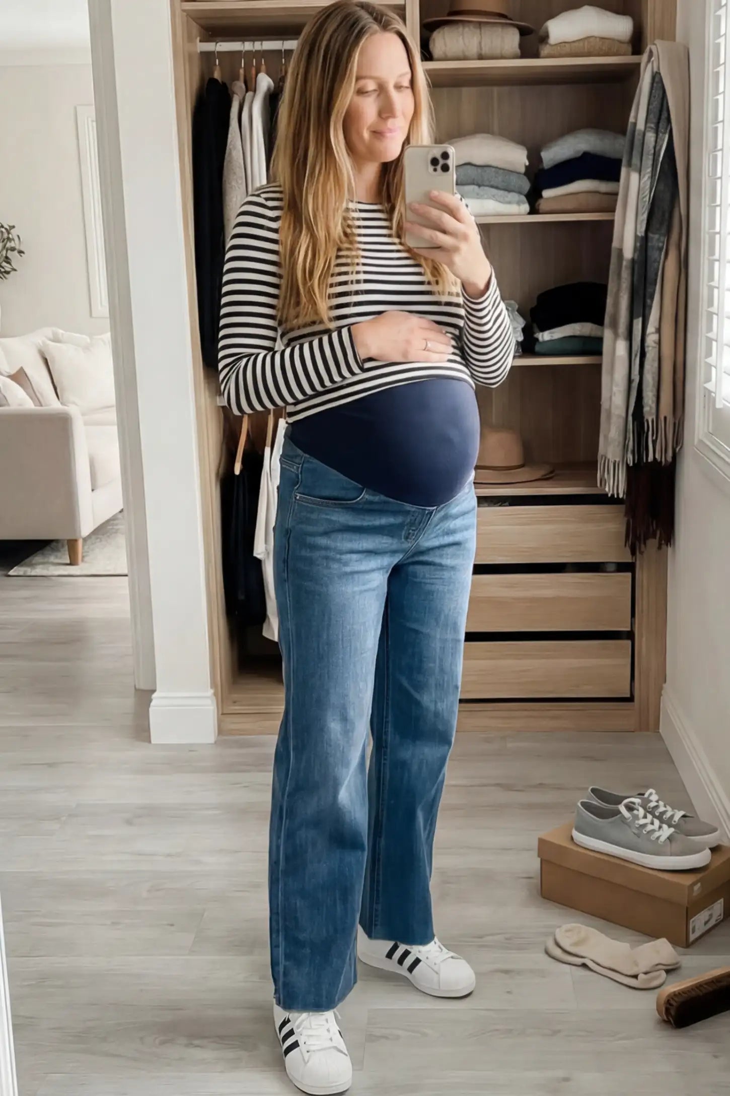 Full Panel Wide Leg Maternity Jeans Full Panel Wide Leg Maternity Jeans in Dark Blue featuring a seamless tummy-support band on a pregnant woman facing front.