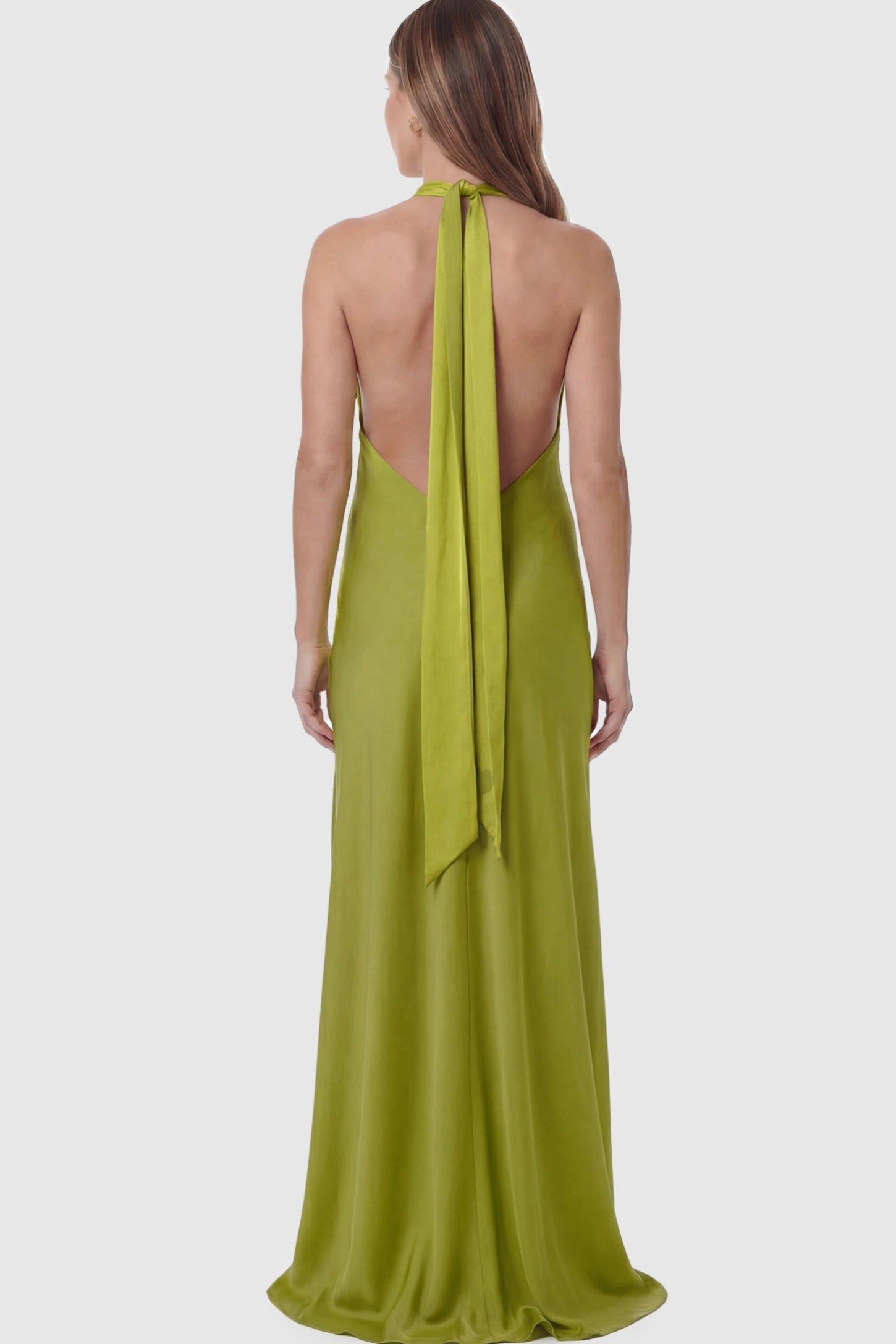 Solid Halter Neck Maternity Maxi Dress Solid Halter Neck Maternity Maxi Dress in Green featuring a flowing skirt and backless design on a pregnant model.
