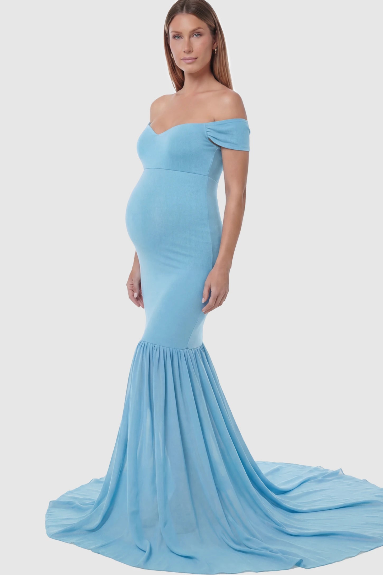 Off Shoulder Mermaid Maternity Photoshoot Gown in Blue featuring a dramatic chiffon train on a pregnant model.