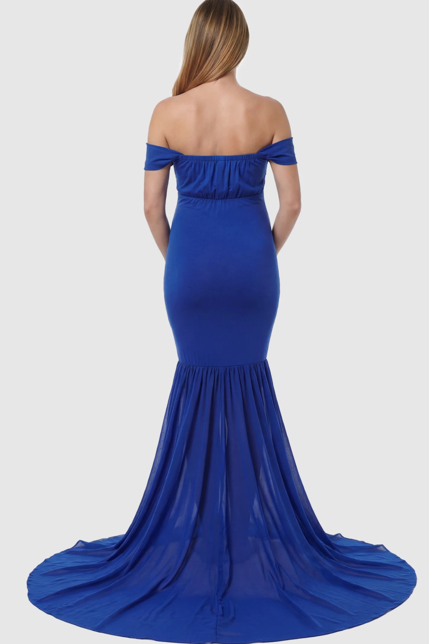 Solid Off Shoulder Mermaid Maternity Photoshoot Gown Off Shoulder Mermaid Maternity Photoshoot Gown in Dark Blue featuring a dramatic chiffon train on a pregnant model.
