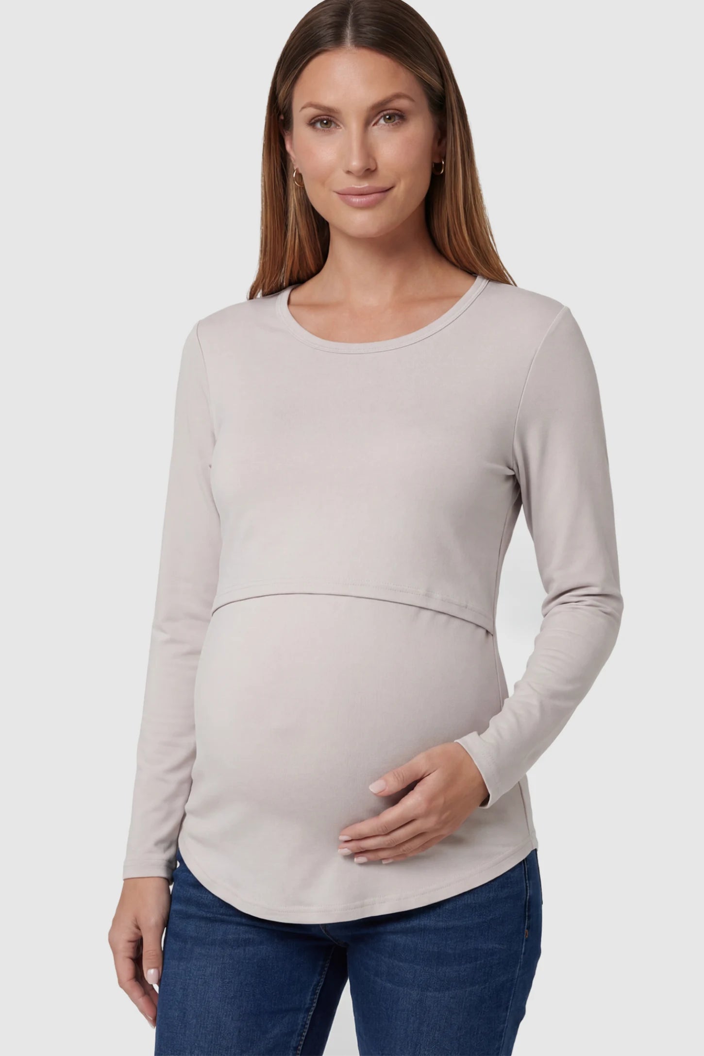 Double Layer Long Sleeve Maternity Nursing Top Double Layer Long Sleeve Maternity & Nursing Top in Light Apricot with a discrete lift-up access on a pregnant model.