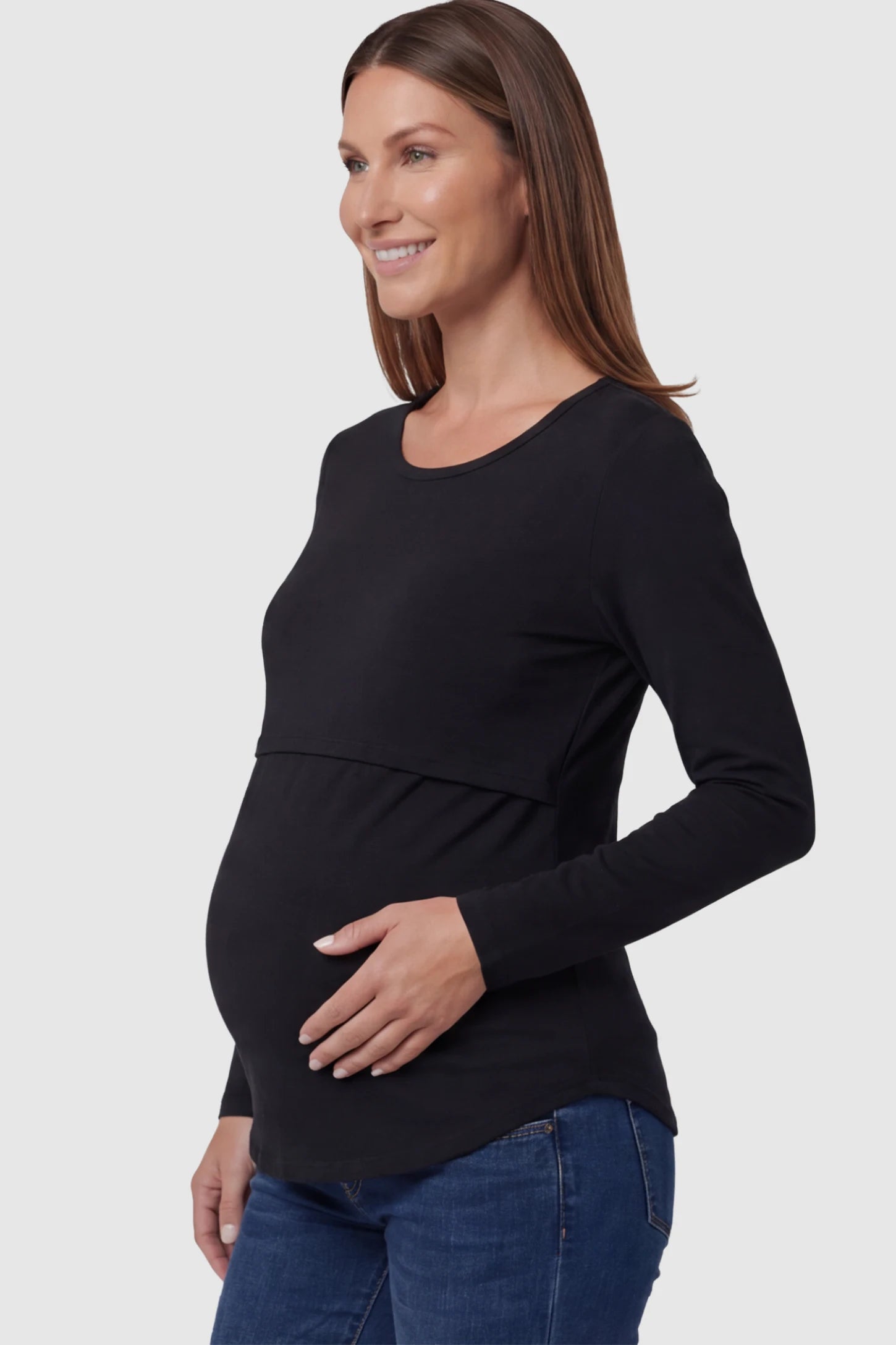 Double Layer Long Sleeve Maternity Nursing Top Double Layer Long Sleeve Maternity & Nursing Top in Black with a discrete lift-up access on a pregnant model.